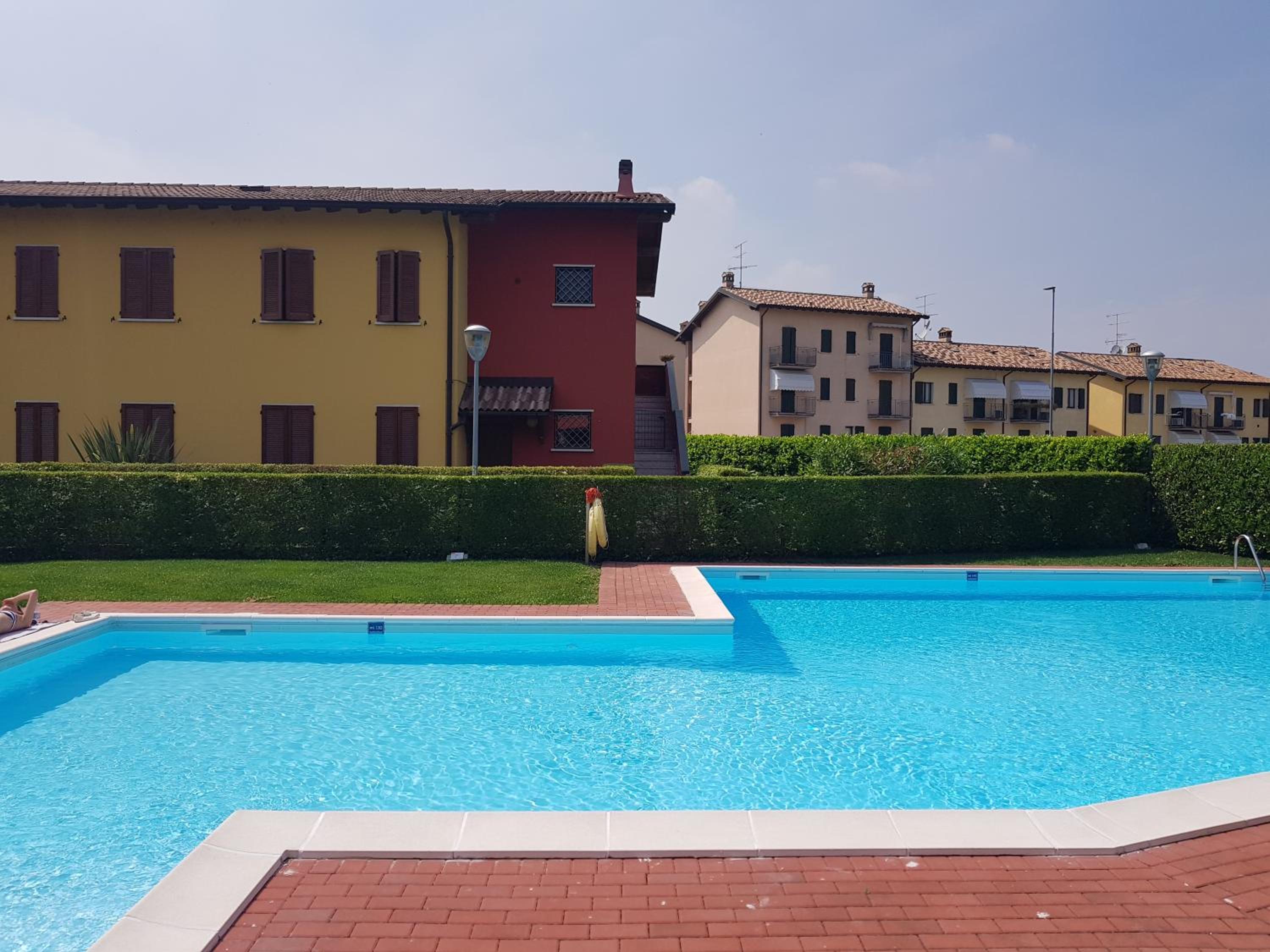 Gardappartamenti Artisti Pool view 2