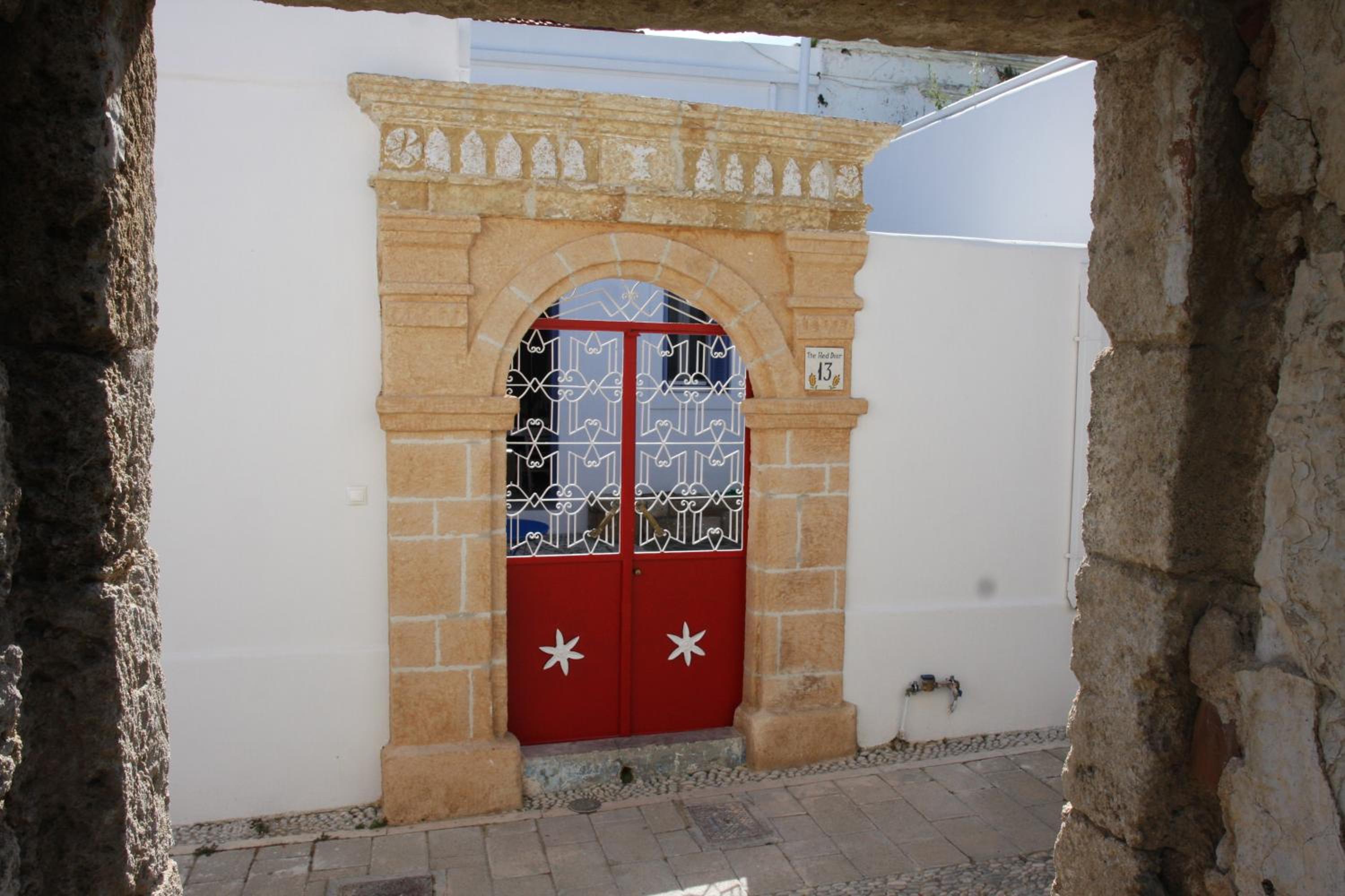 The red door in Koskinou