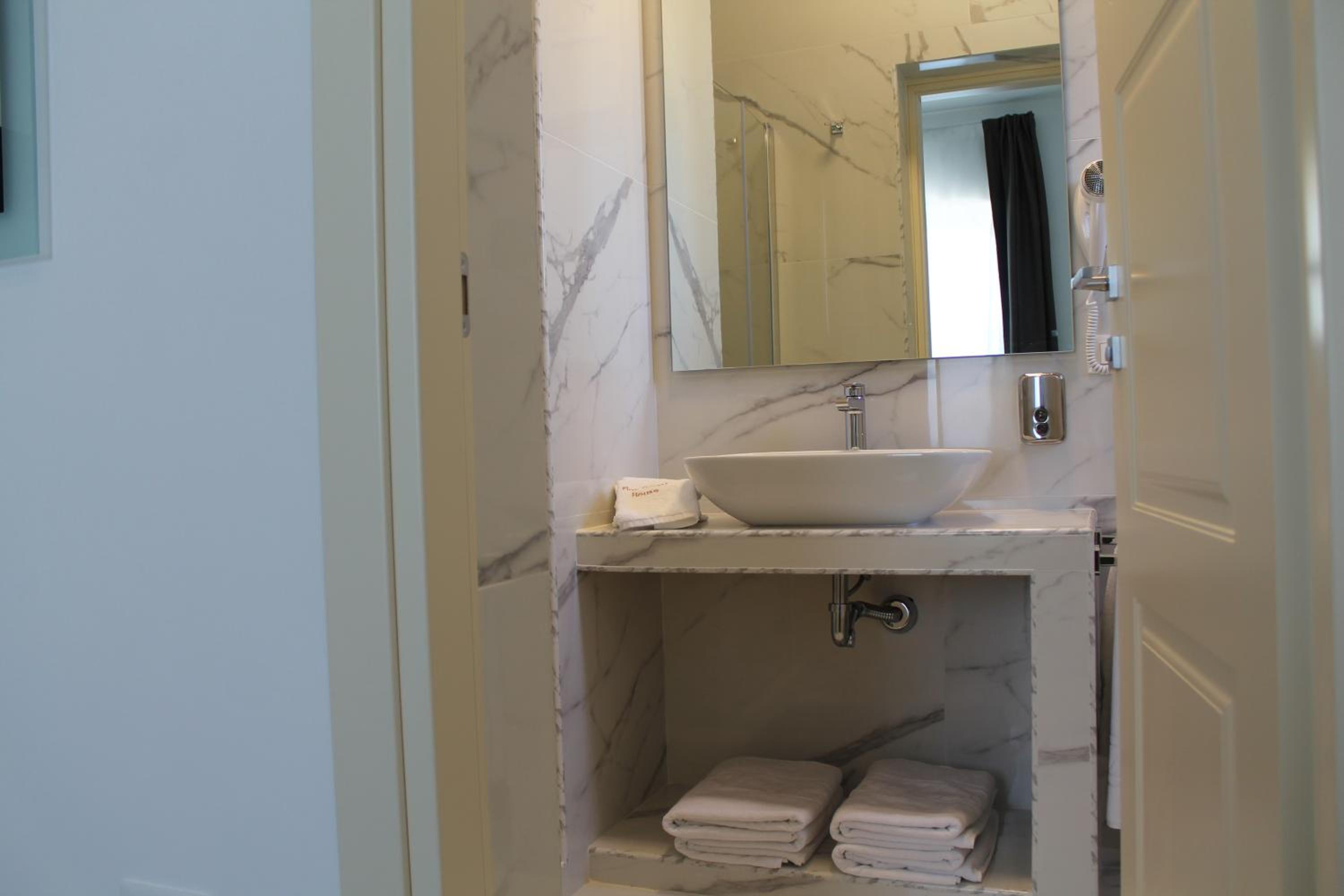 FLOS Guest House
