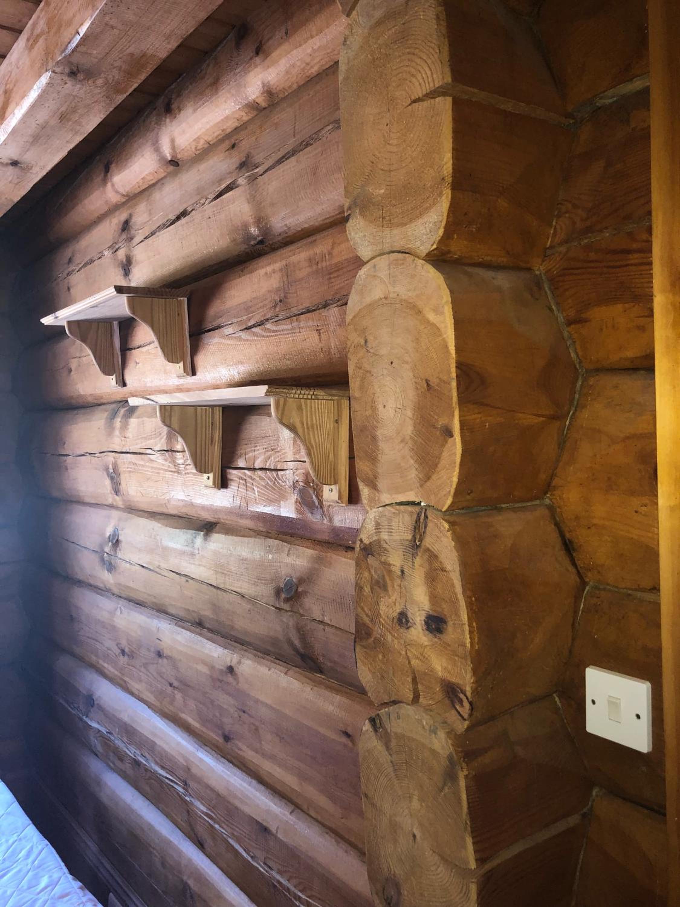 Log home village view 4