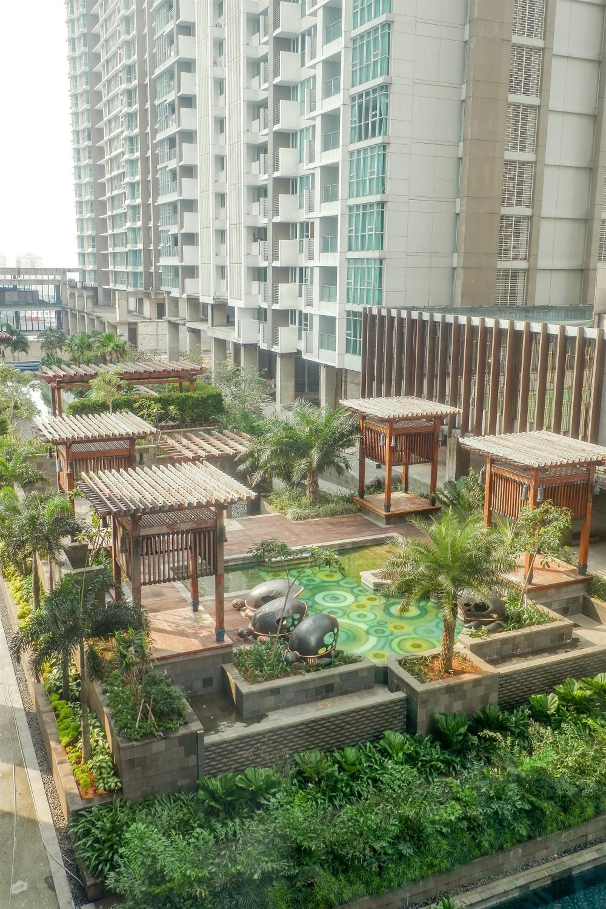 2BR Apartment Cozy Pool View Kemang Village with Access to Mall By Travelio