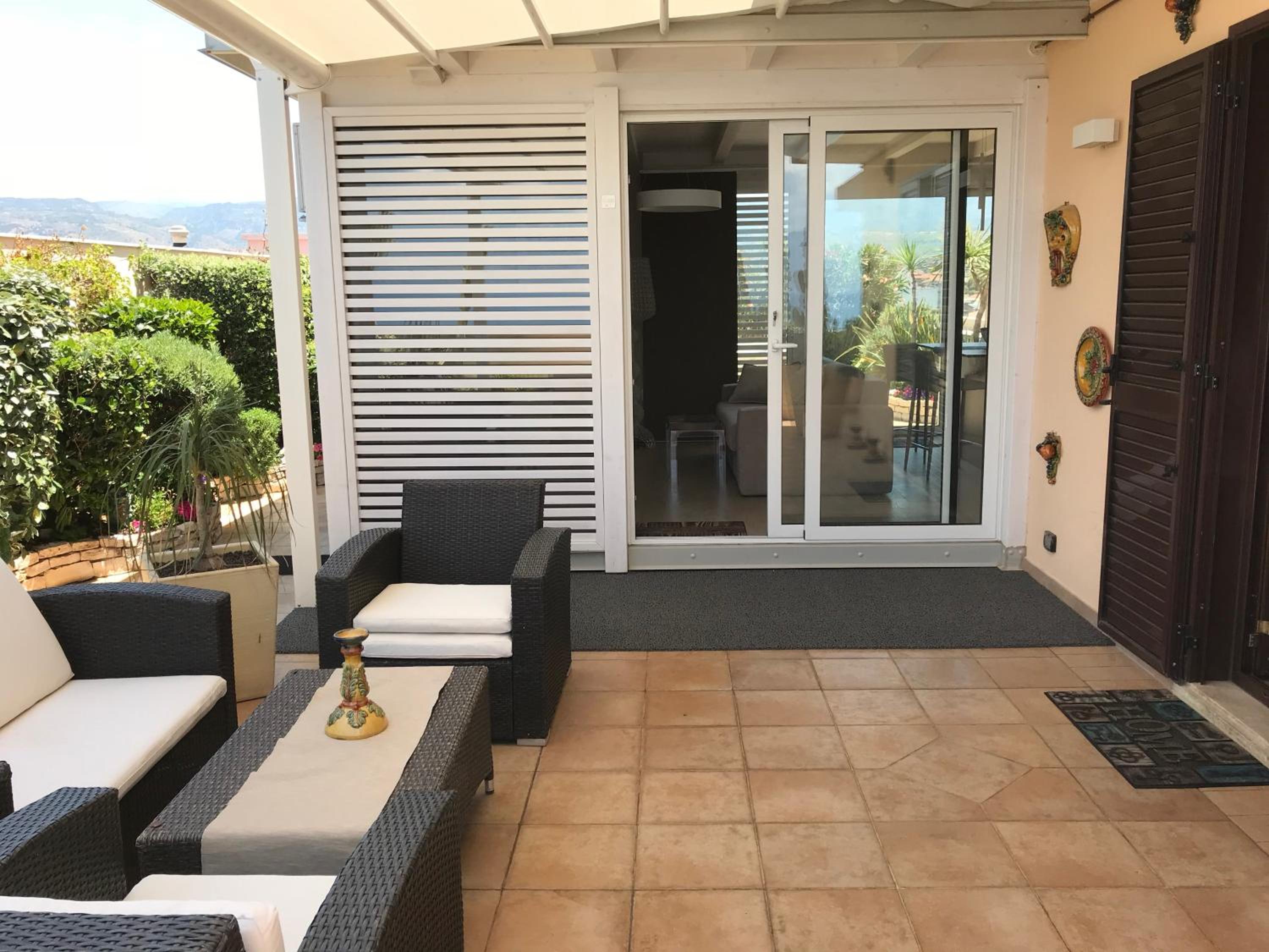 Sunset Terrazza en Reggio Calabria — balance & terrace