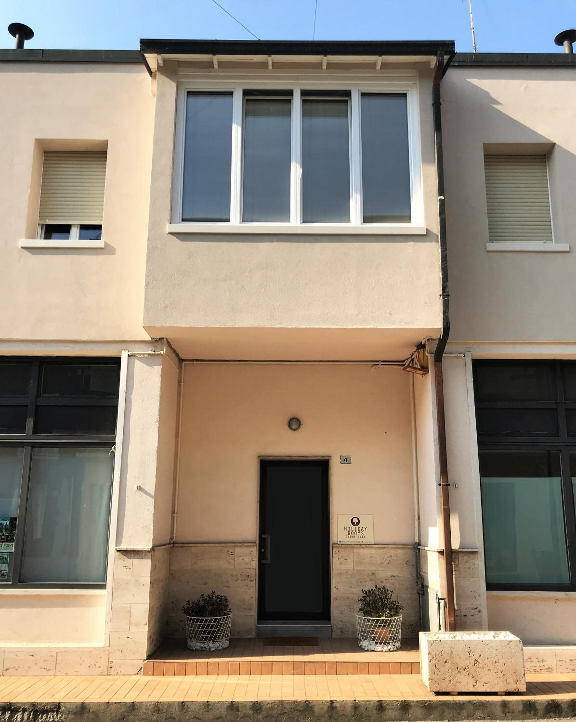 Hotel Gardaselle Holiday Rooms - Image 1