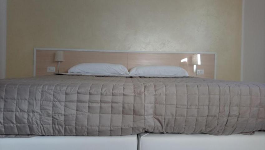 Gli Angeli en Loreto — bedroom