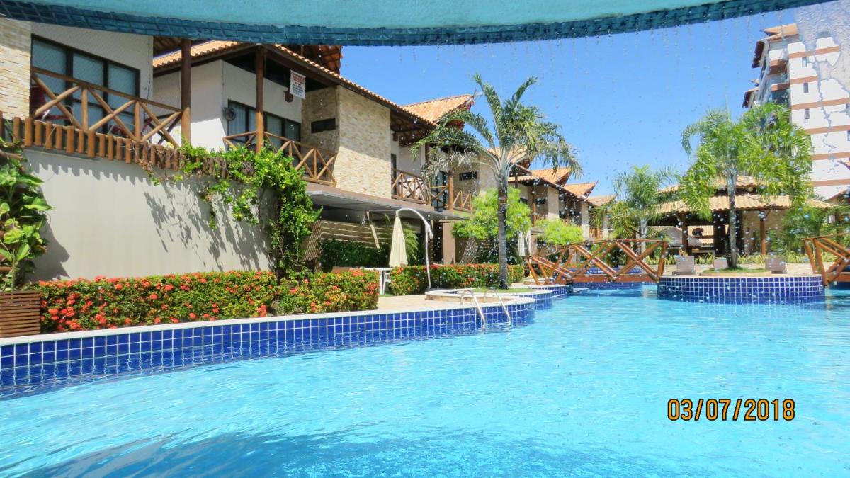 Bangalô com área de lazer estilo resort