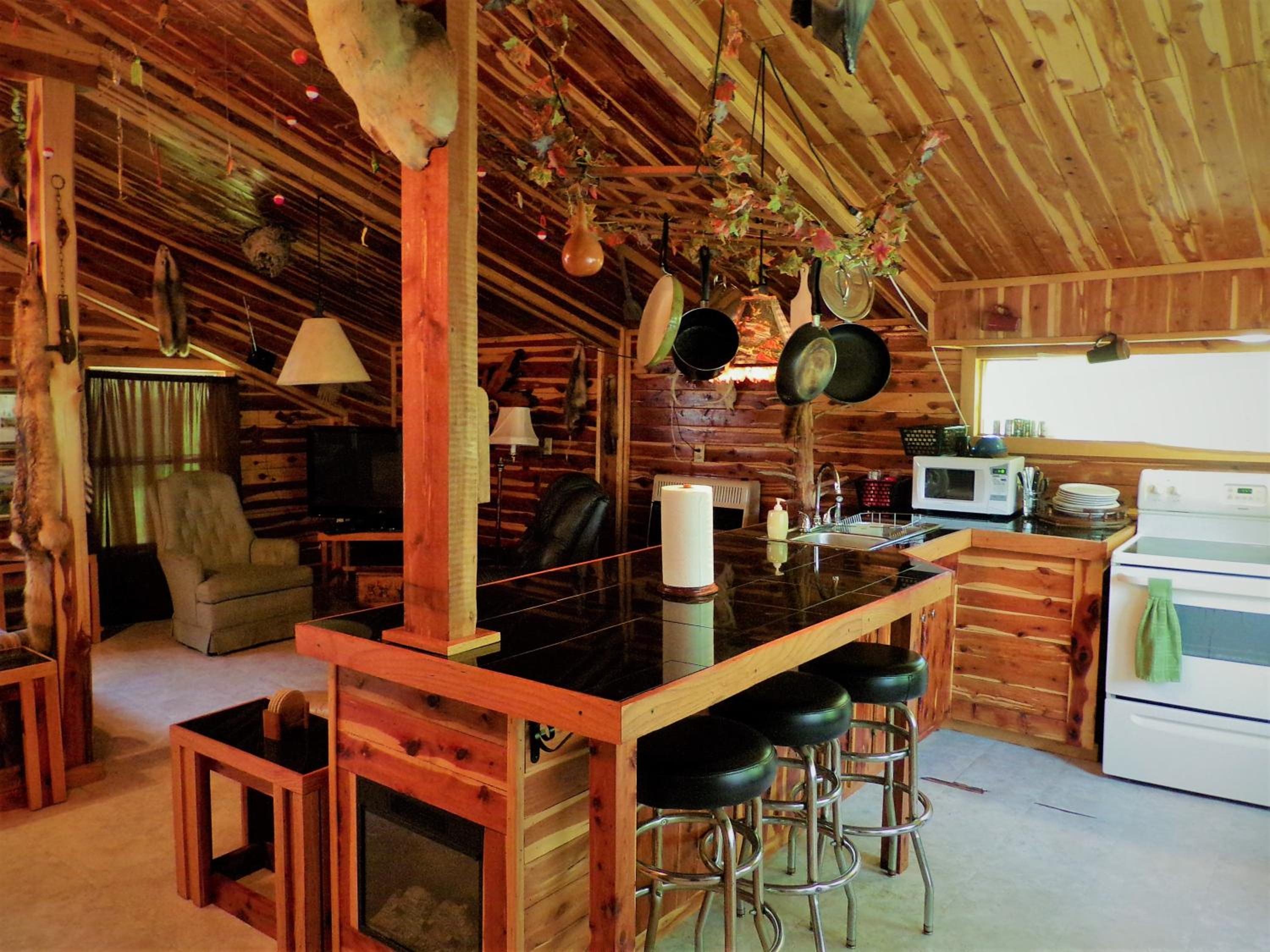 Cedar cabin located on a buffalo farm view 5