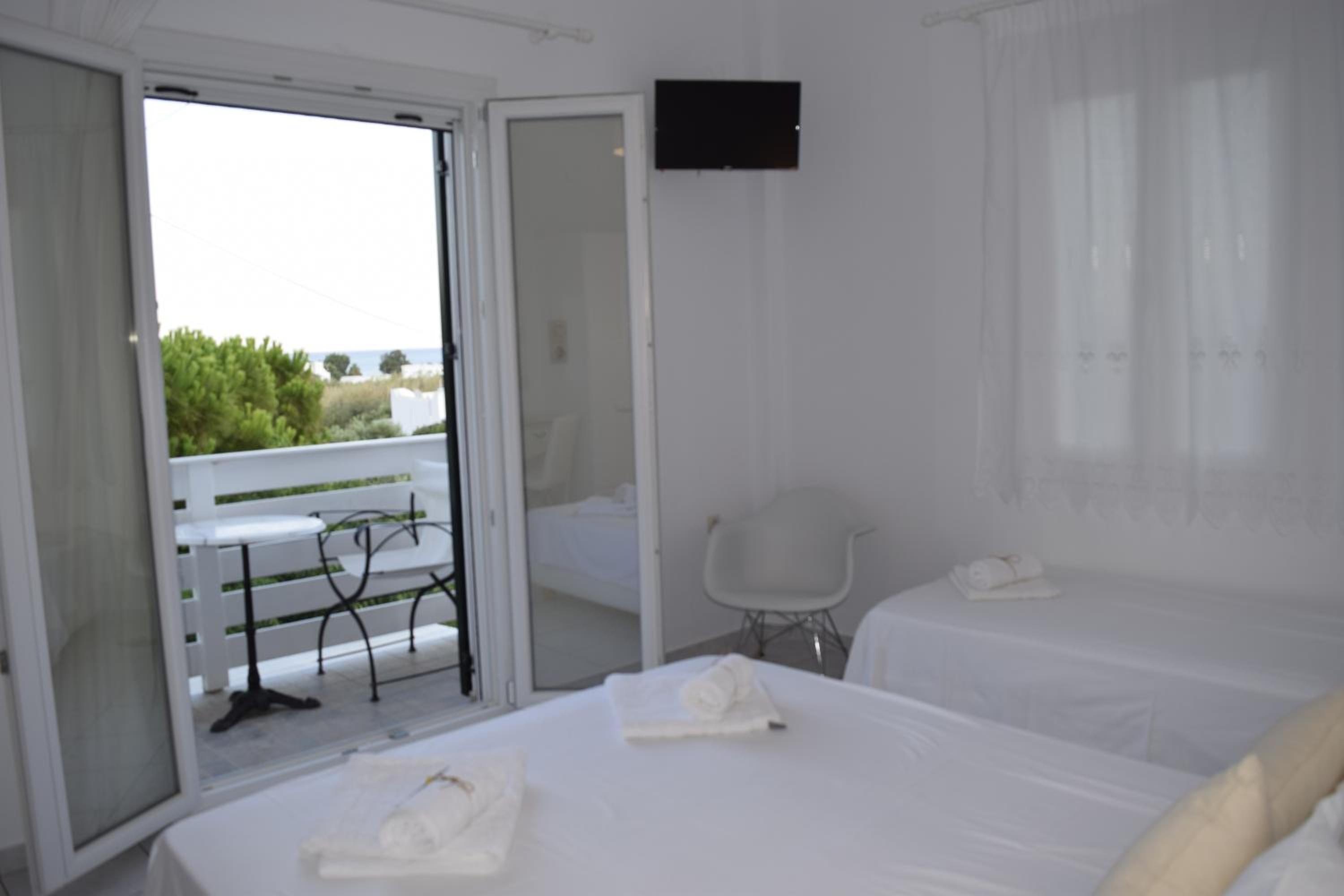Tzane Studios & Apartments - Steps away from Golden Beach view 5