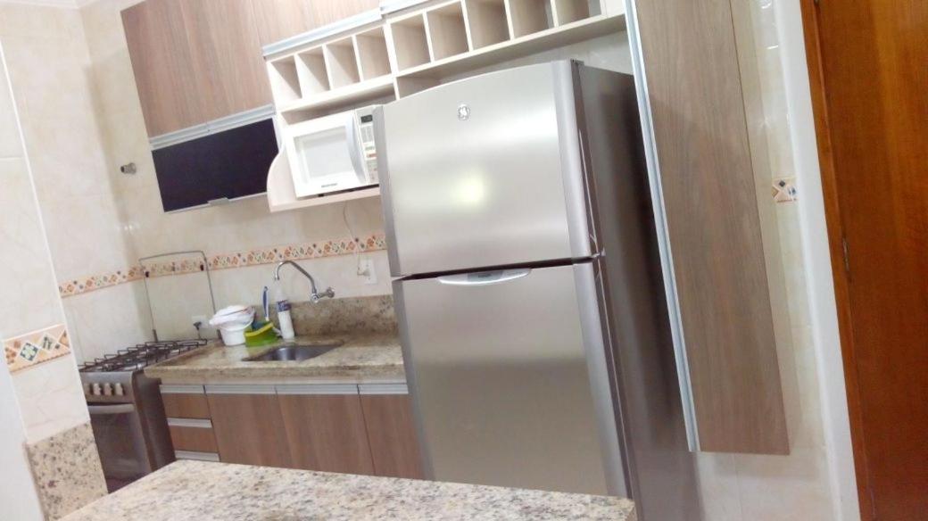 Apto. (pé na areia) com Churrasqueira na sacada