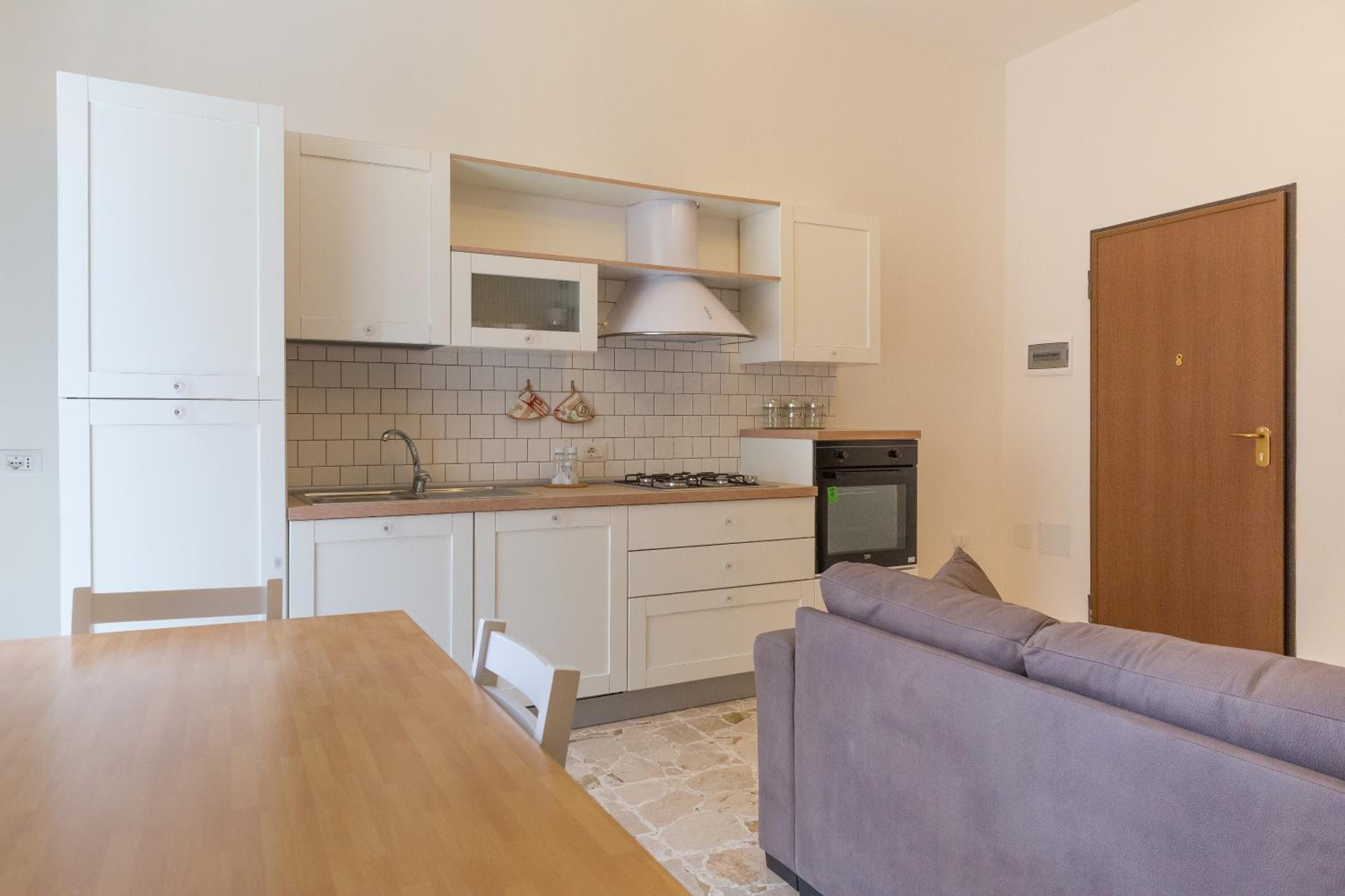 Central Apartments en Noto — kitchen