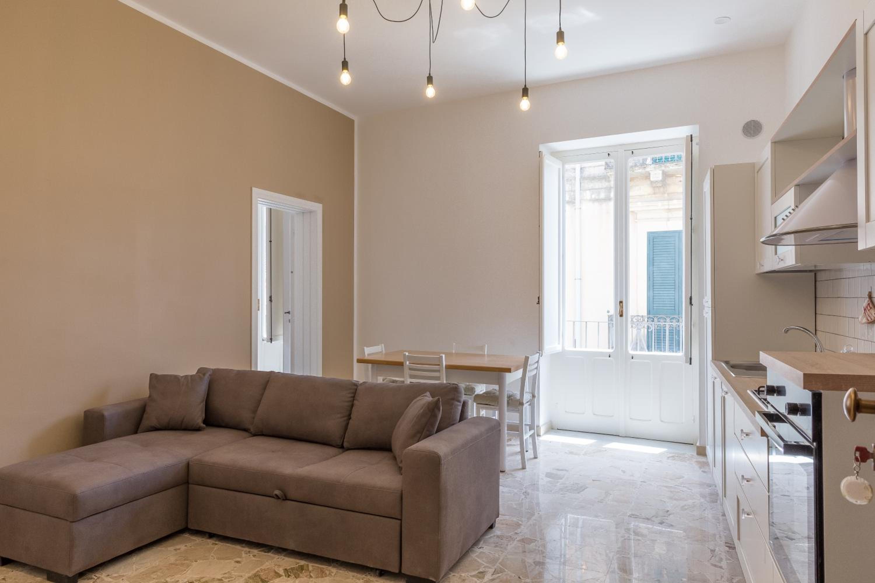 Central Apartments en Noto — hotel room