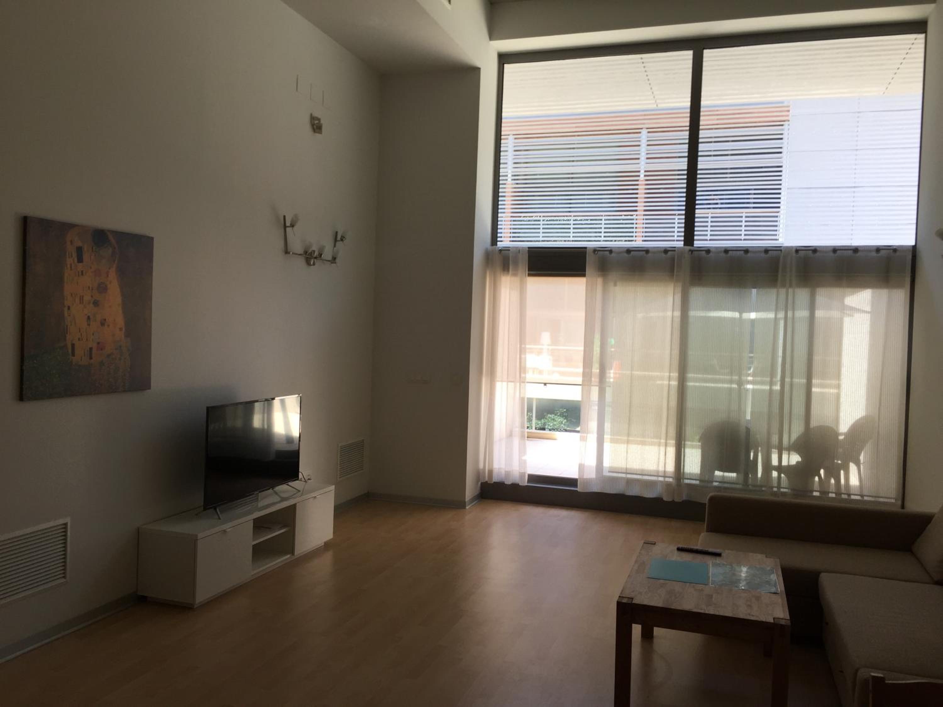 Loft with terrace 24m2, swimming pool and garage view 5