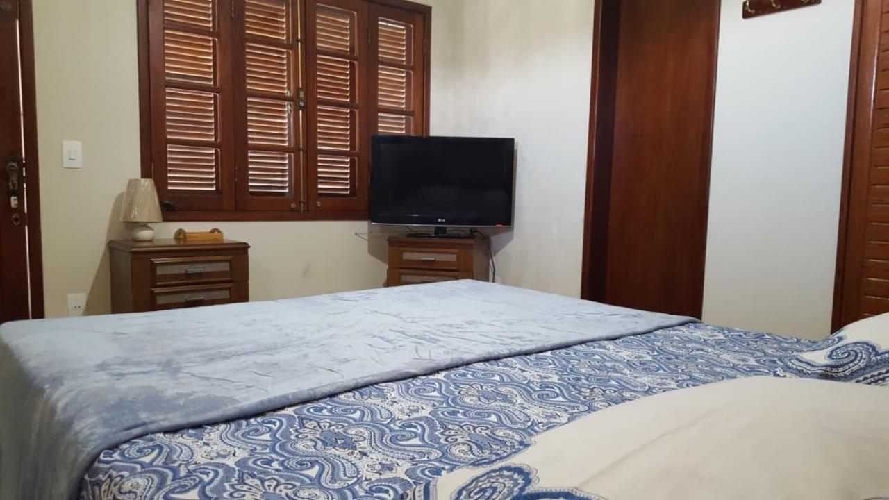Casa Banho de Mar à 1 quadra da praia com Piscina, Wi-Fi e Ar condicionado