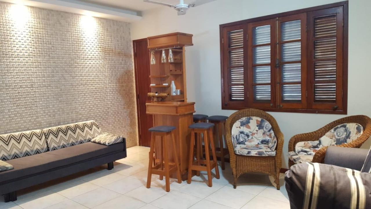 Casa Banho de Mar à 1 quadra da praia com Piscina, Wi-Fi e Ar condicionado