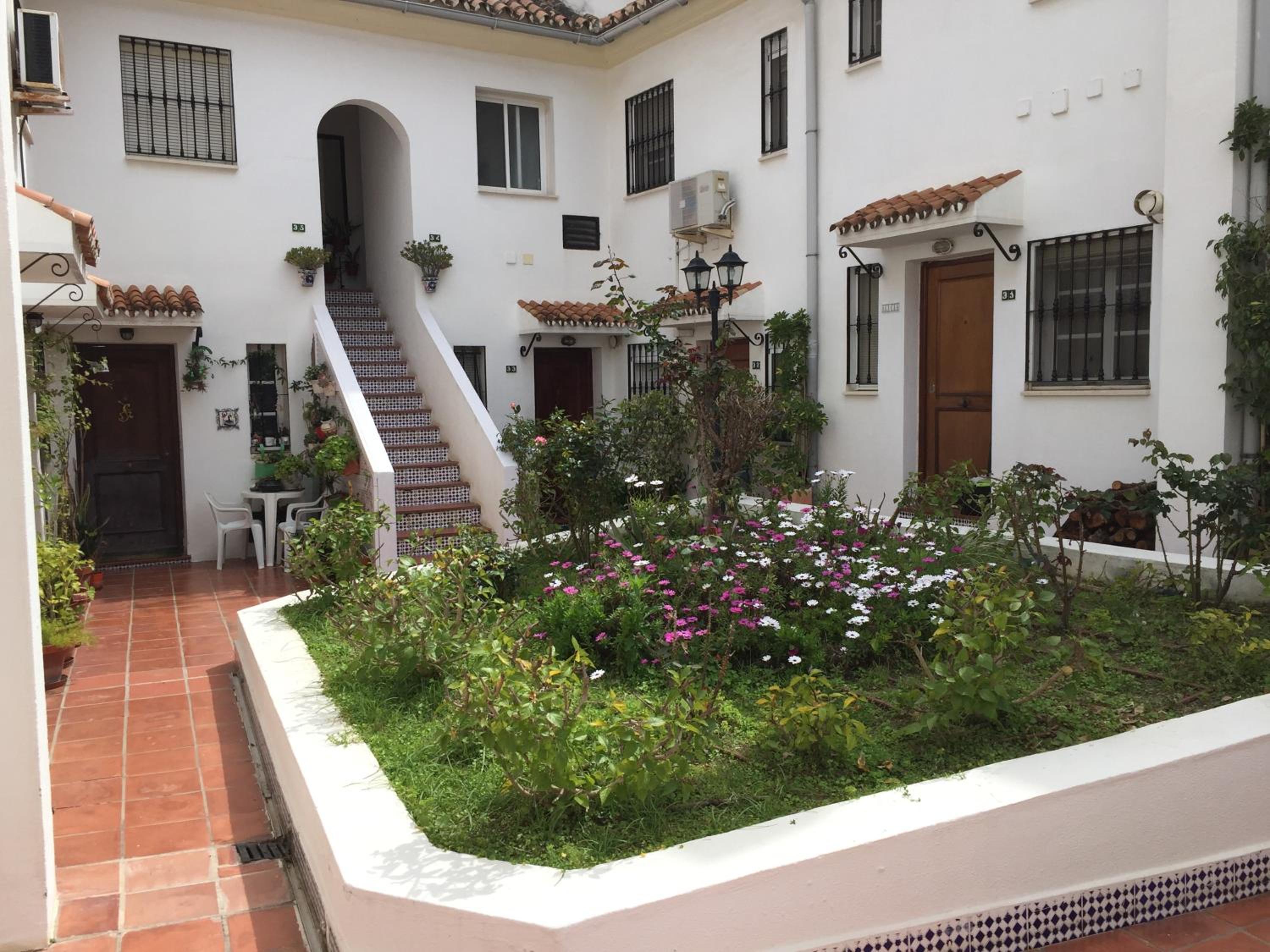 El Cortijuelo. Magnificent triplex terraced house with rooftop of 18m2, overlooking the sea. Parking view 4
