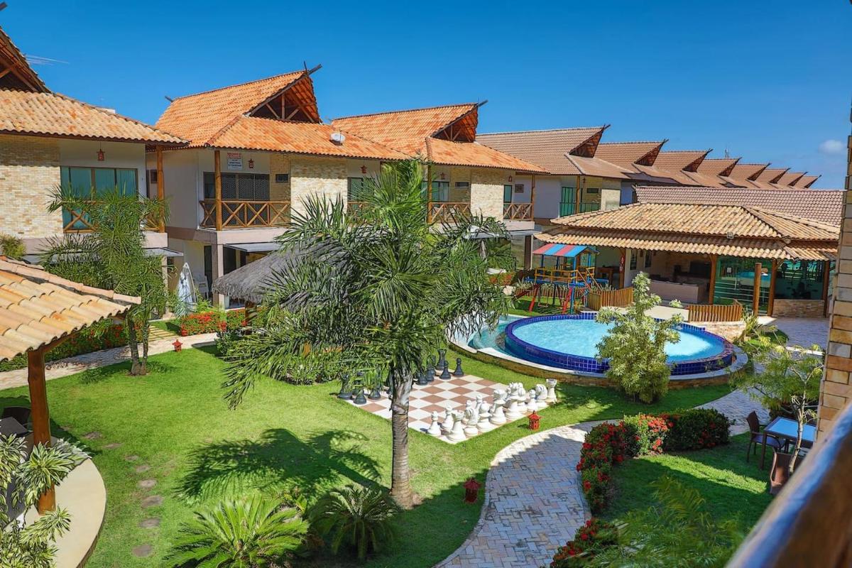 Bangalô com área de lazer estilo resort