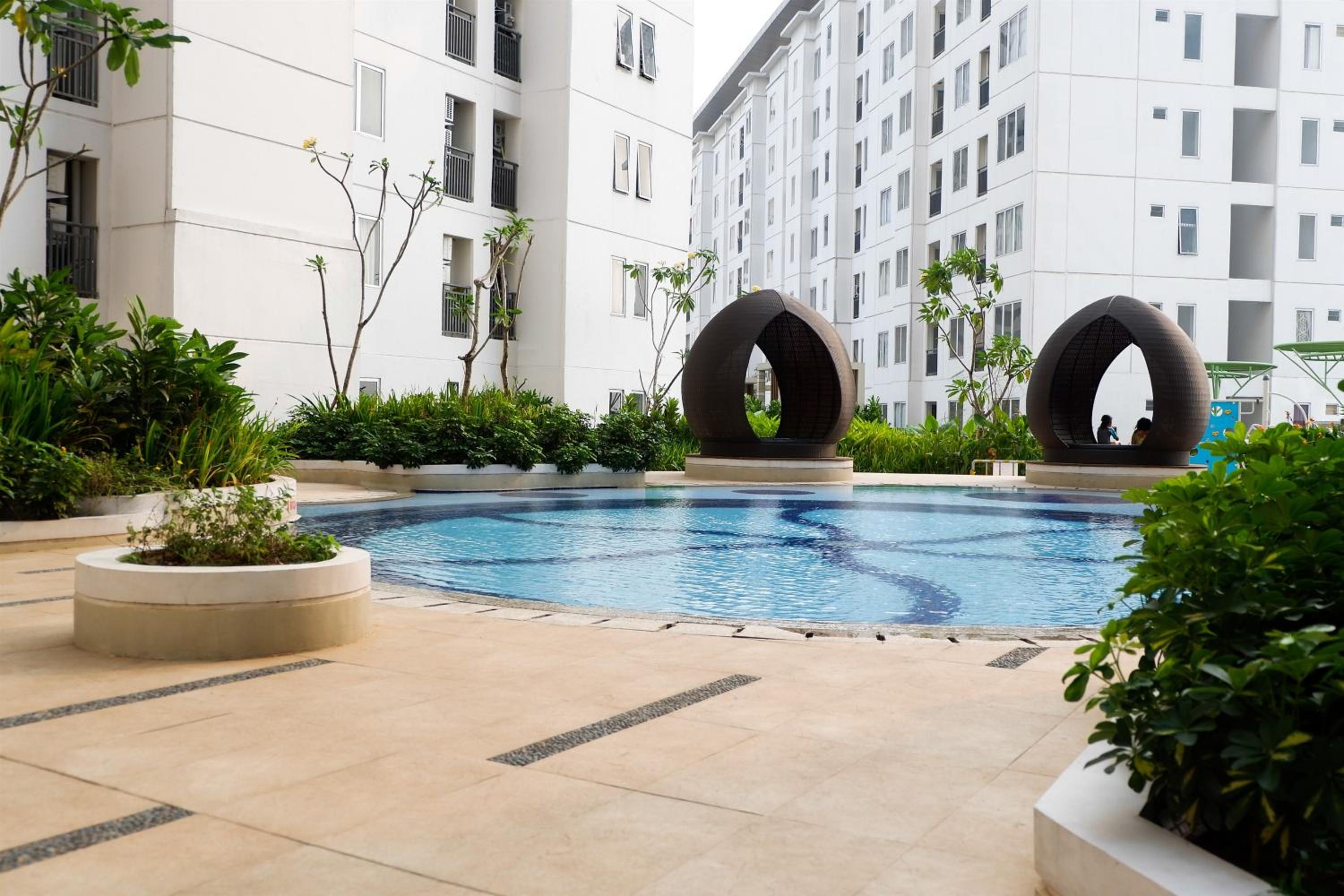 Exquisite 2BR Bassura City Apartment near Shopping Mall By Travelio