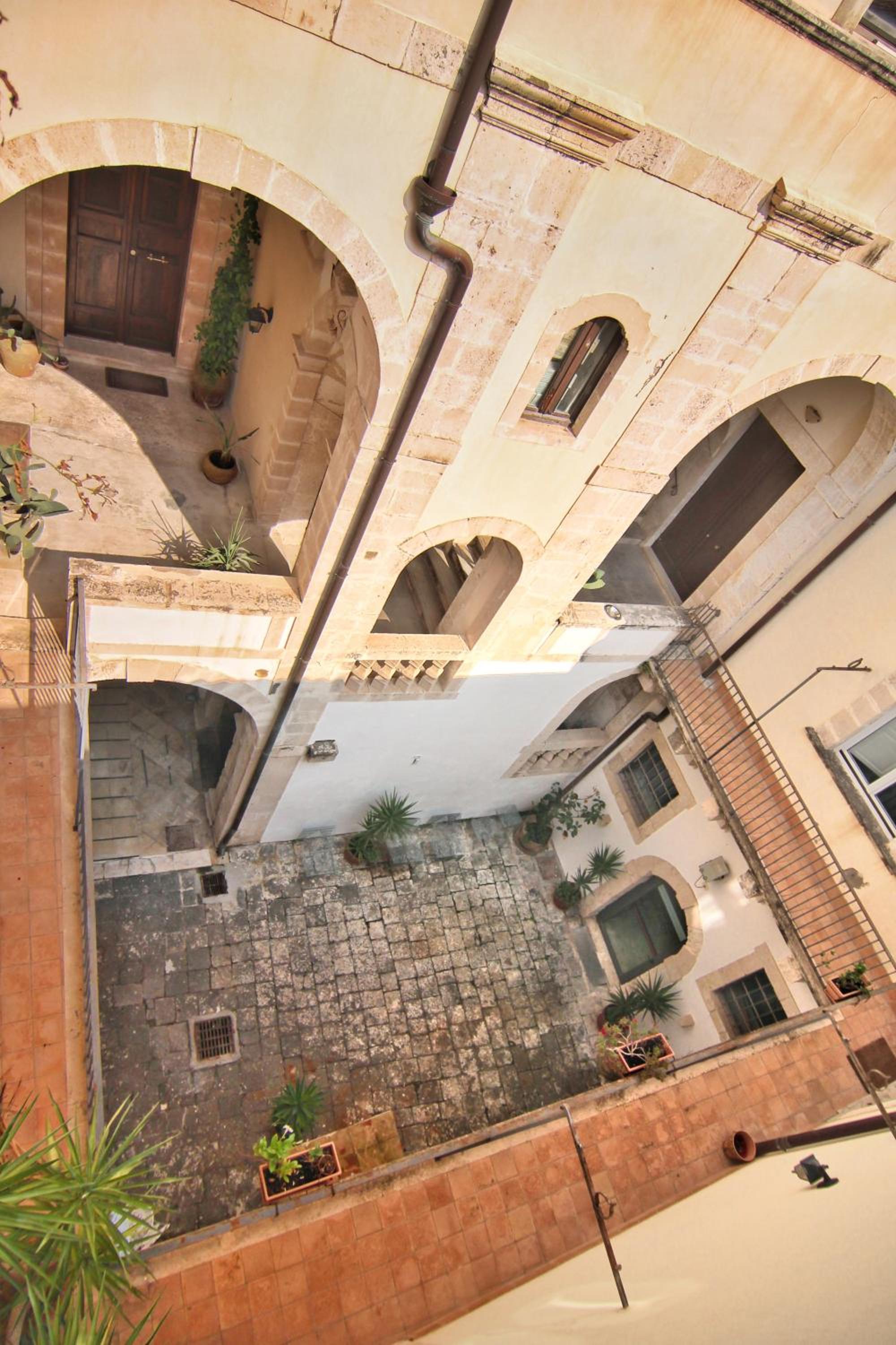 Incantevole appartamento in palazzo storico Ortigia