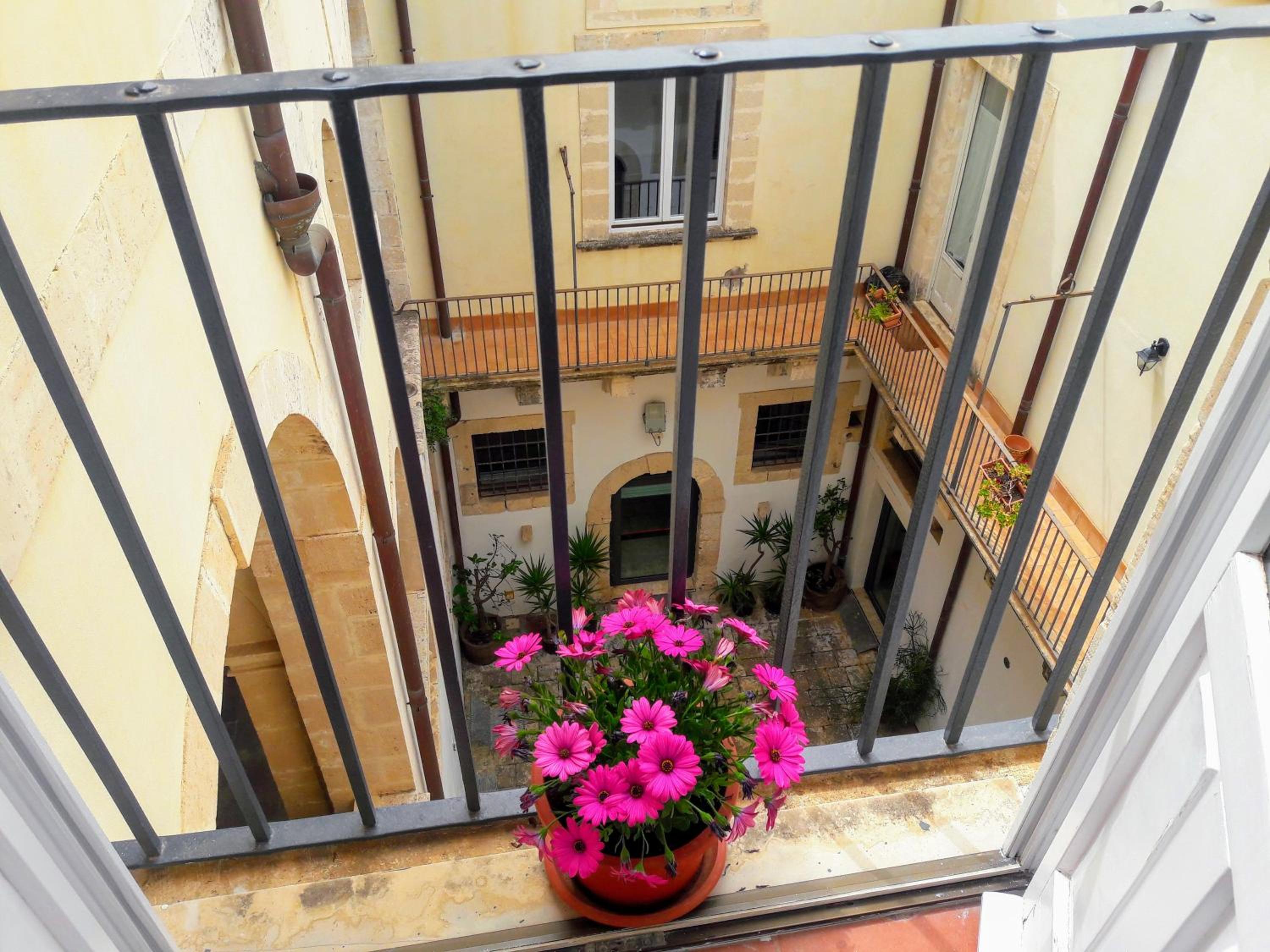 Incantevole appartamento in palazzo storico Ortigia