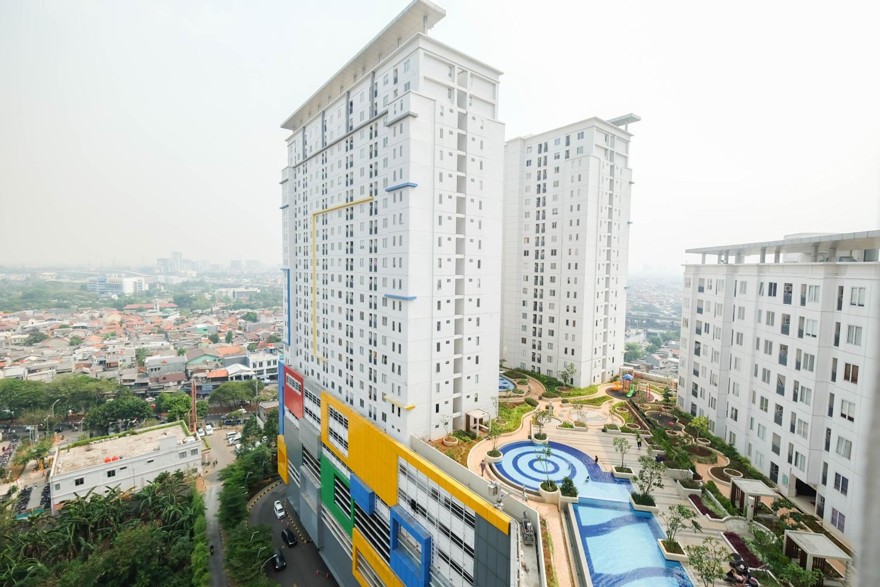 Cozy 2BR Bassura City Apartment By Travelio
