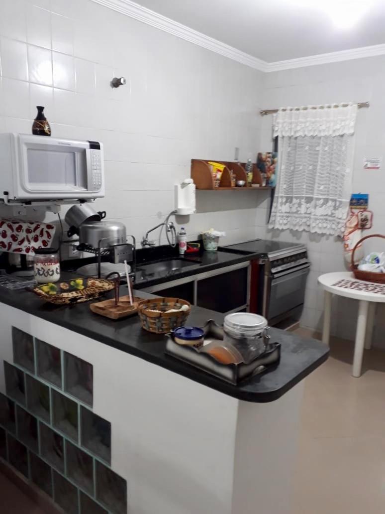 Sobrado Aconchegante em Condominio - Praia Martim de Sá - checkout flexível
