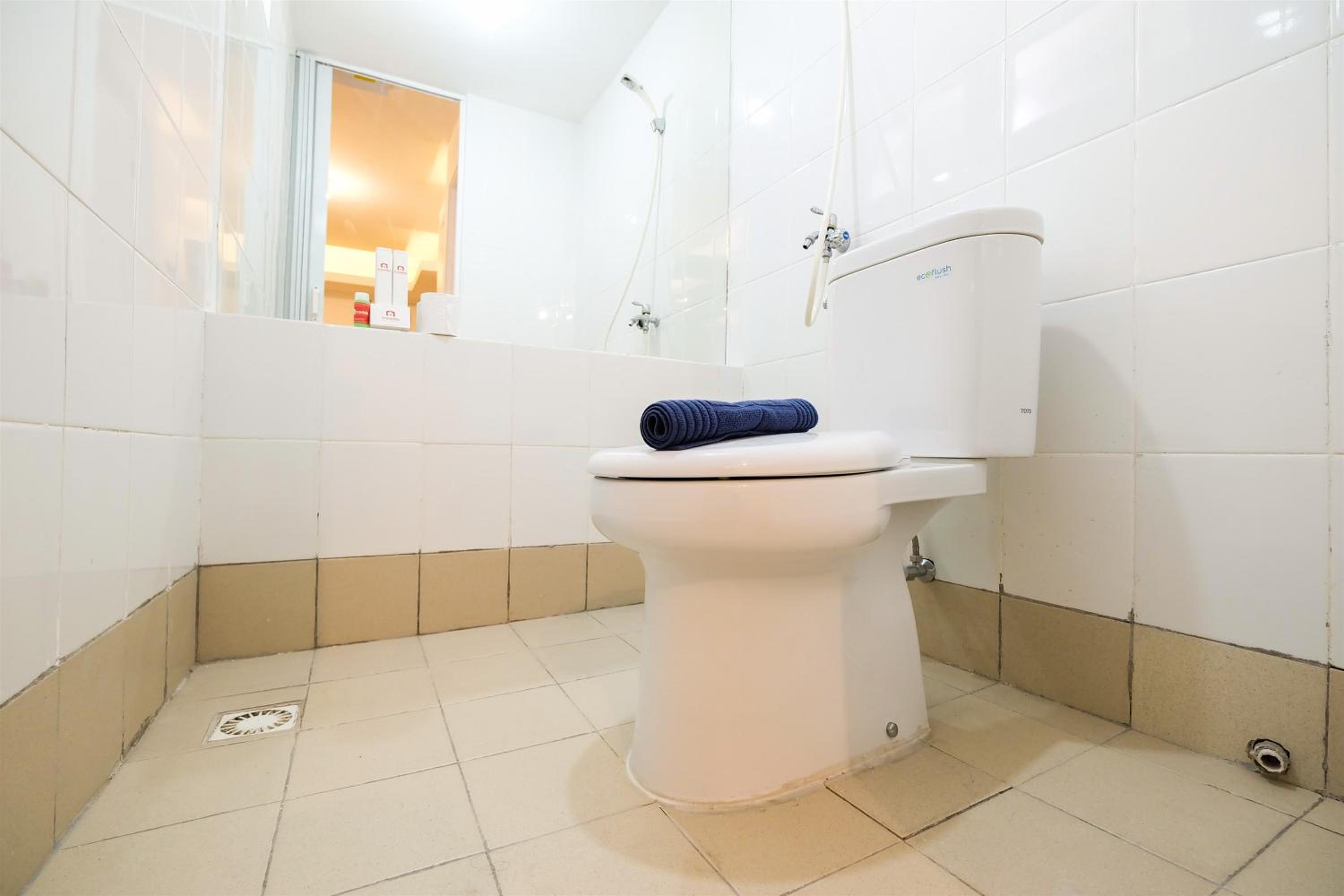Spacious 2BR Apartment Connected to Mall at Bassura City By Travelio