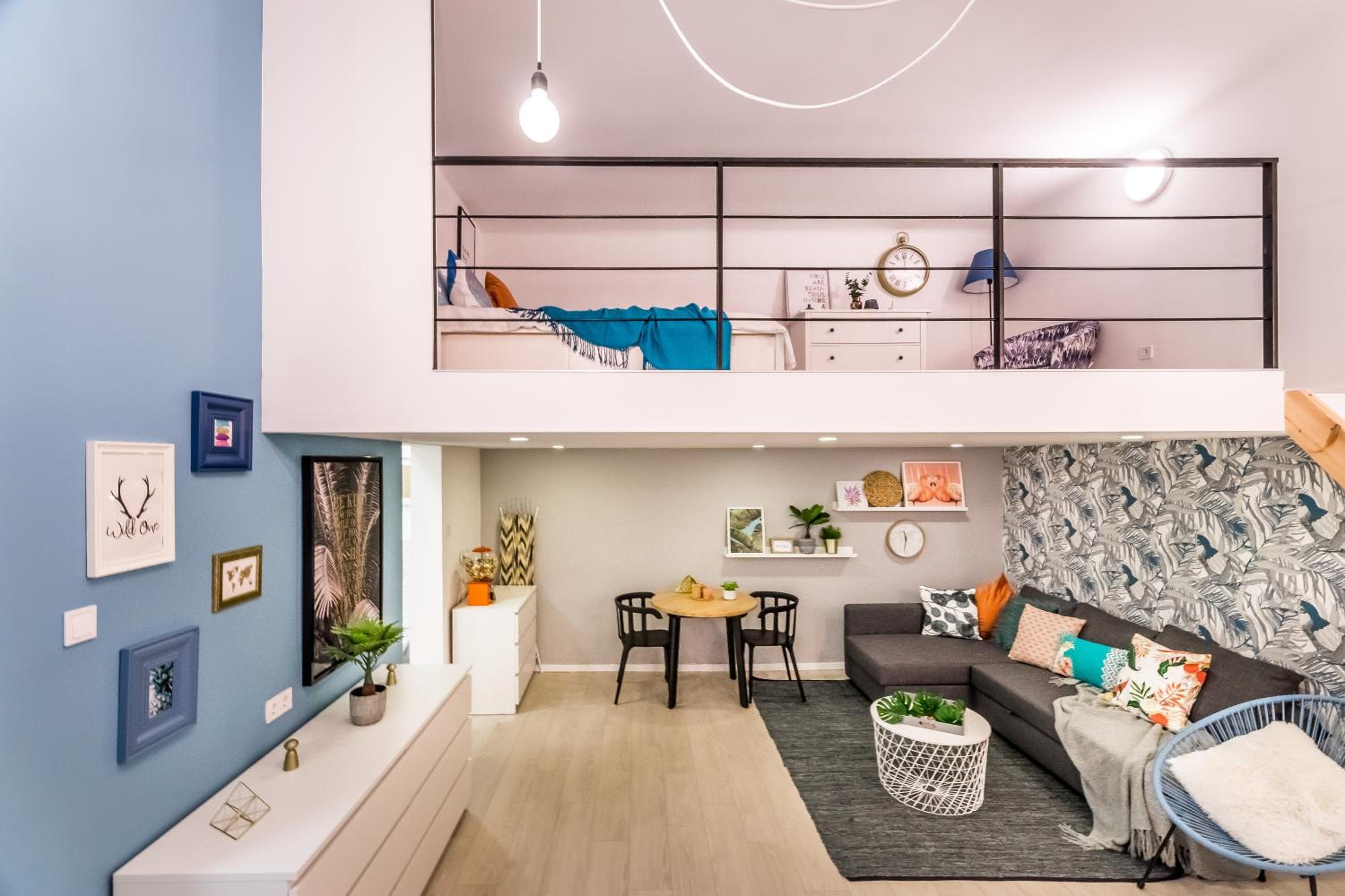 Chic Loft with Toucan Wallpaper and Airy Vibes view 2