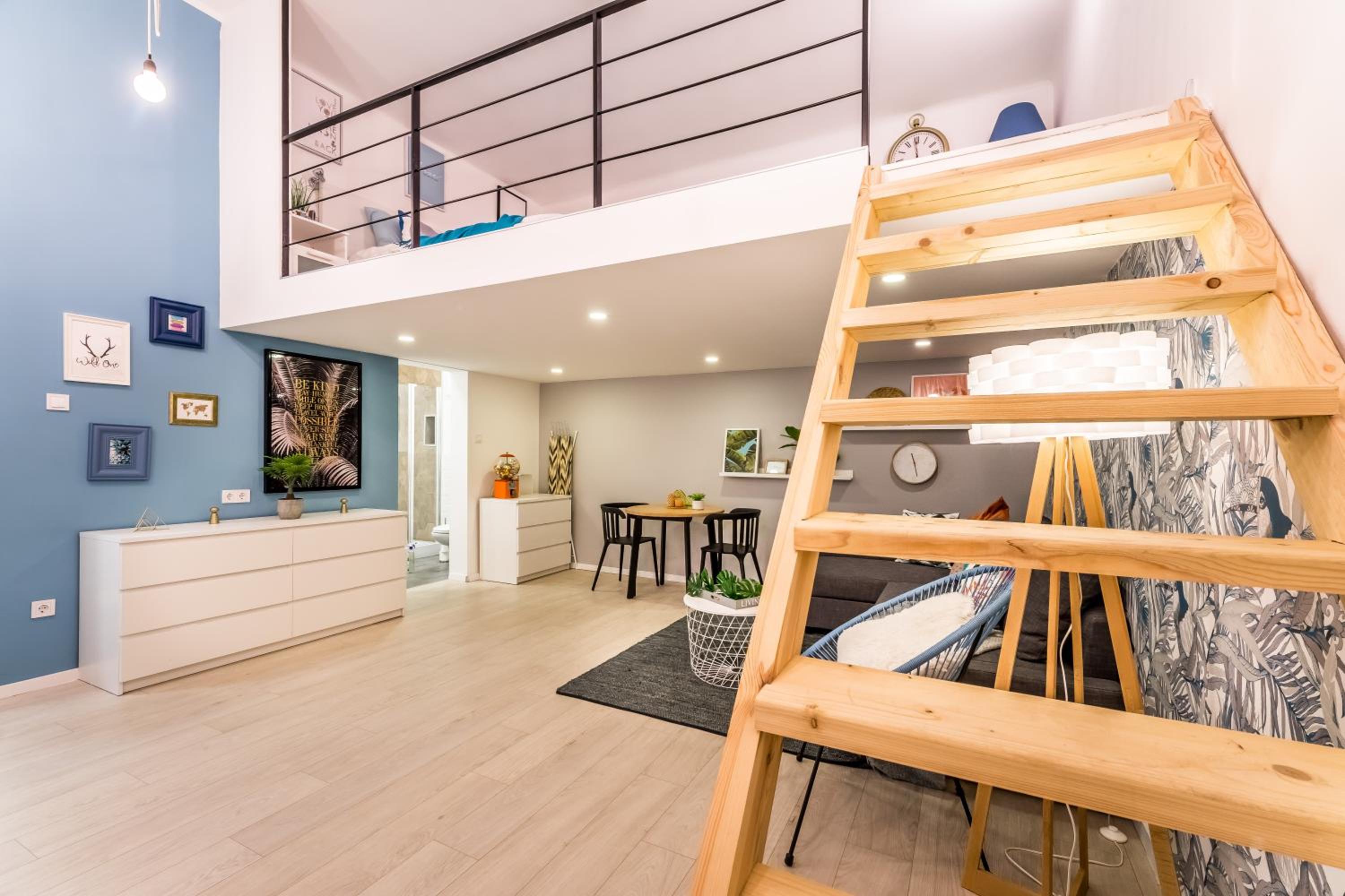 Chic Loft with Toucan Wallpaper and Airy Vibes view 3