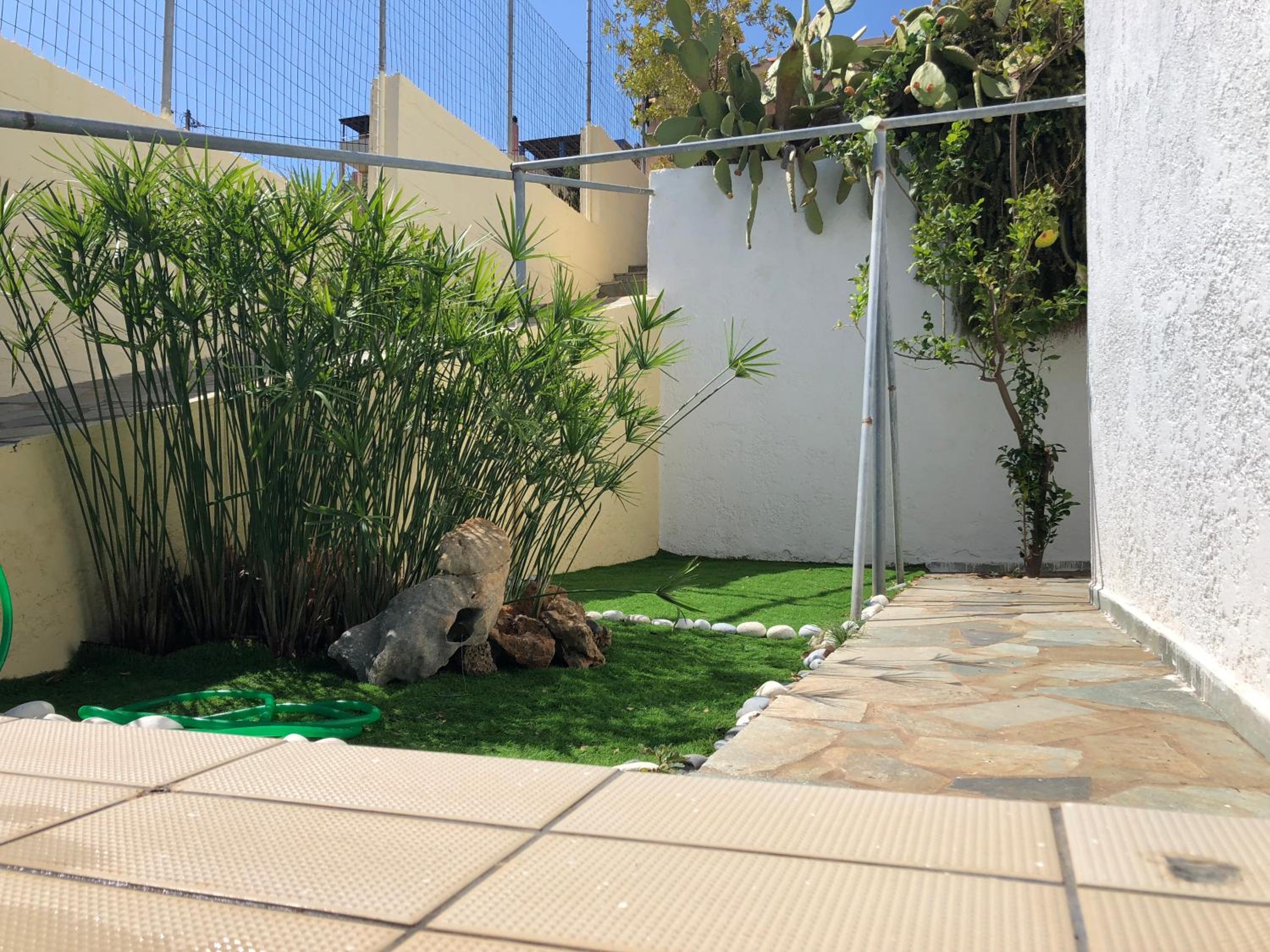 Family Apartment Ammoudi with shared mini-pool view 2