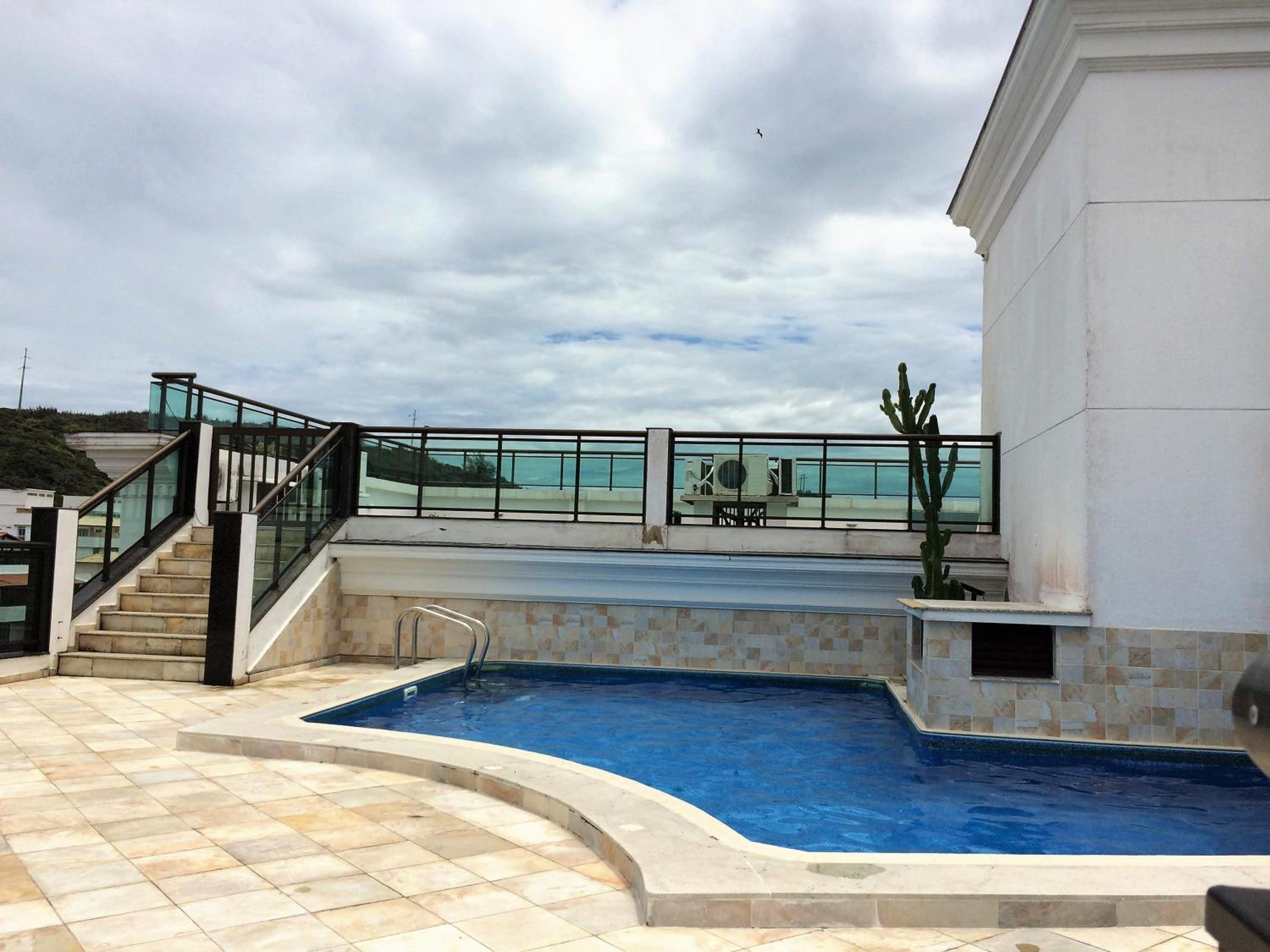 Loft Prainha AP 207 frente mar, check in 9h-check out 13h, split, piscina, self check in, portaria 24h