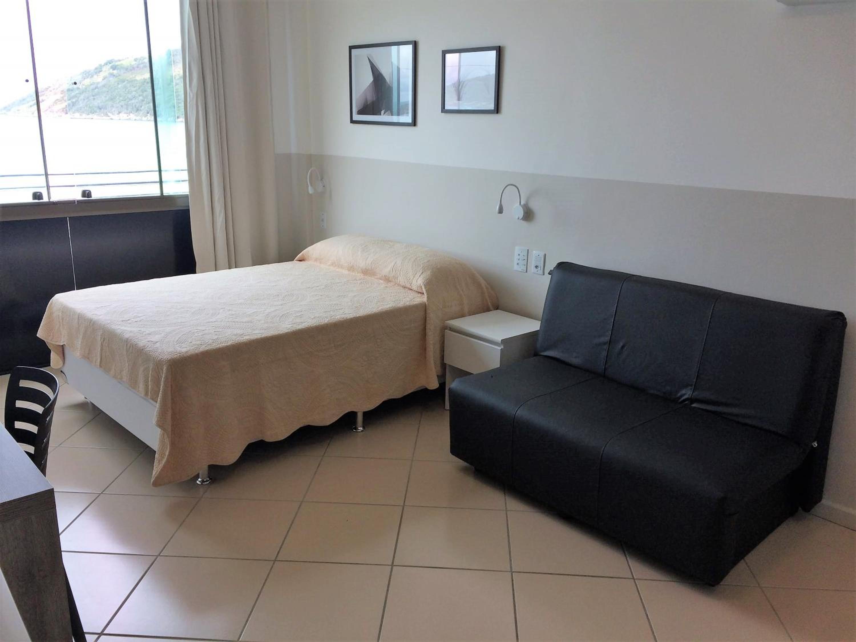 Loft Prainha AP 207 frente mar, check in 9h-check out 13h, split, piscina, self check in, portaria 24h