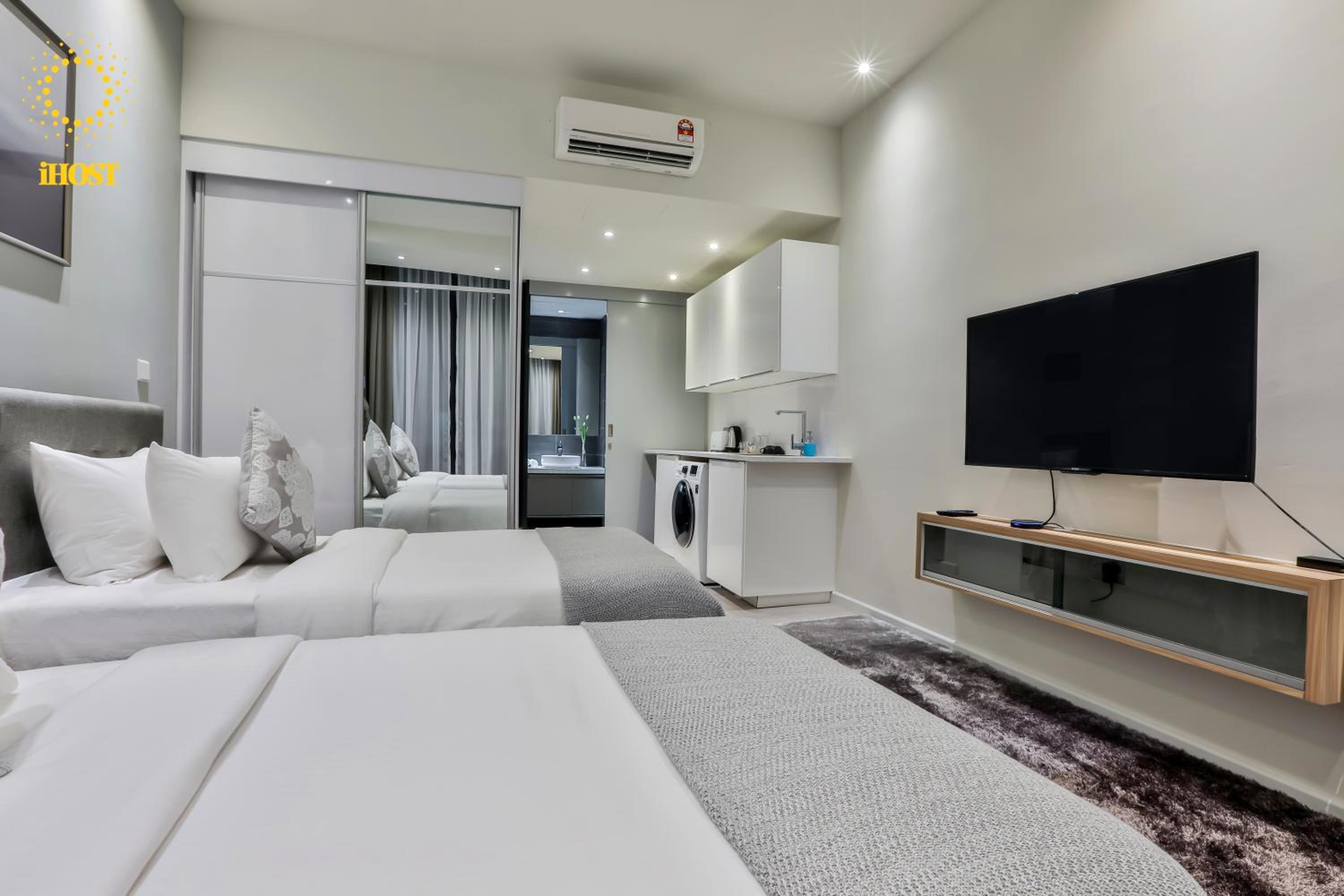 Expressionz Suites By iHost Global