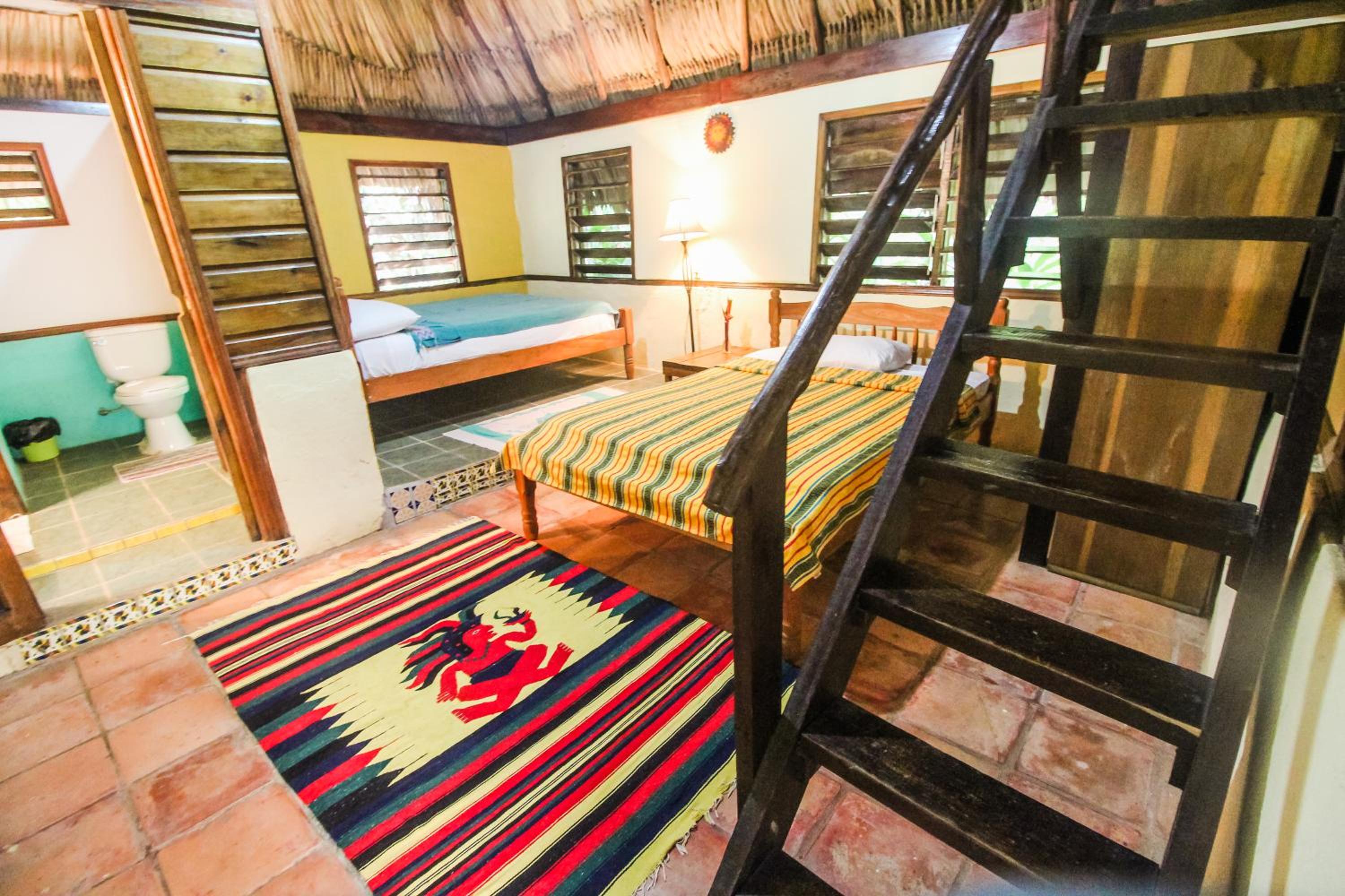 Cohune Palms River Cabanas