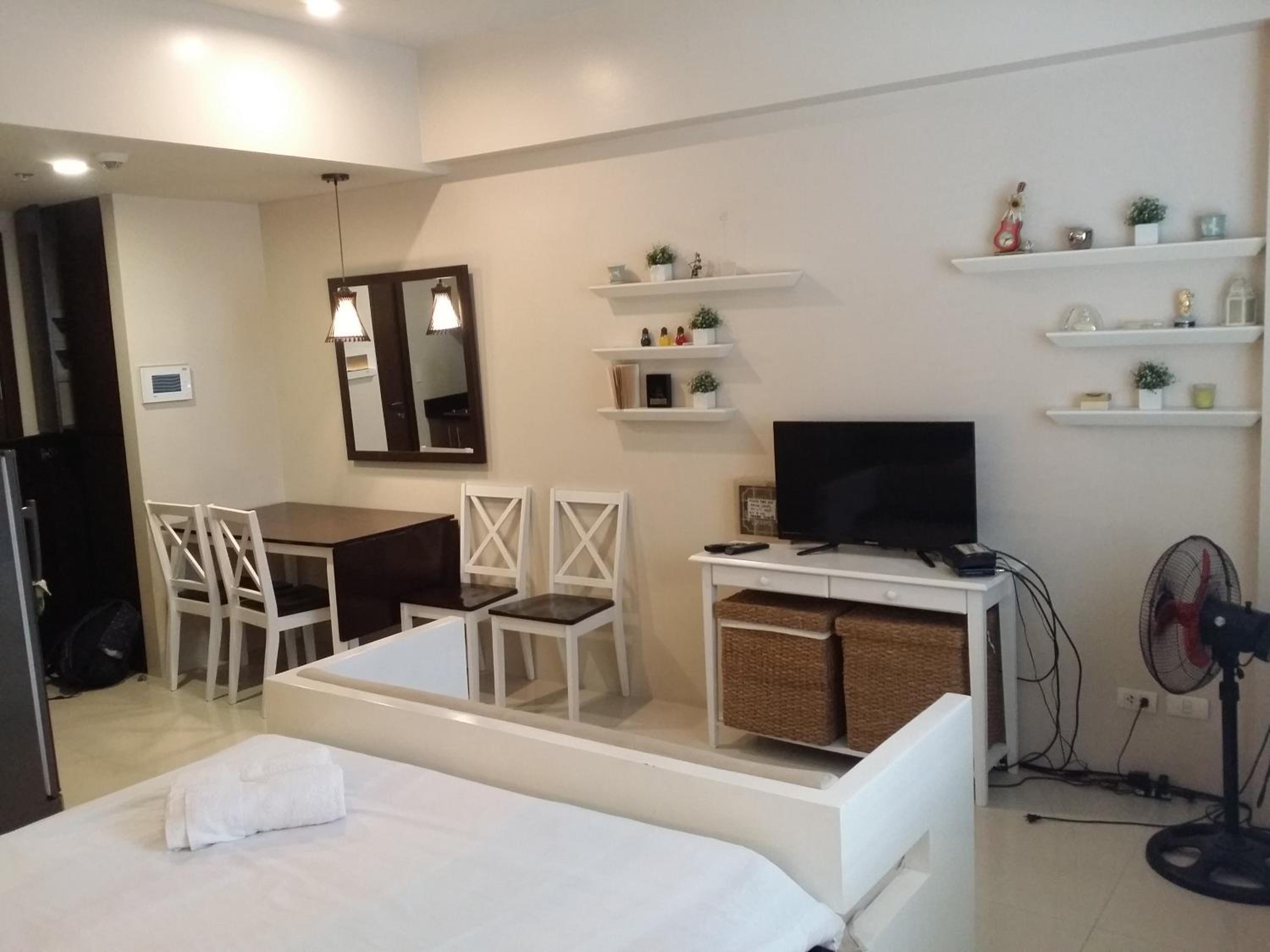 Palm Tree Condos across NAIA3 by Beth view 3