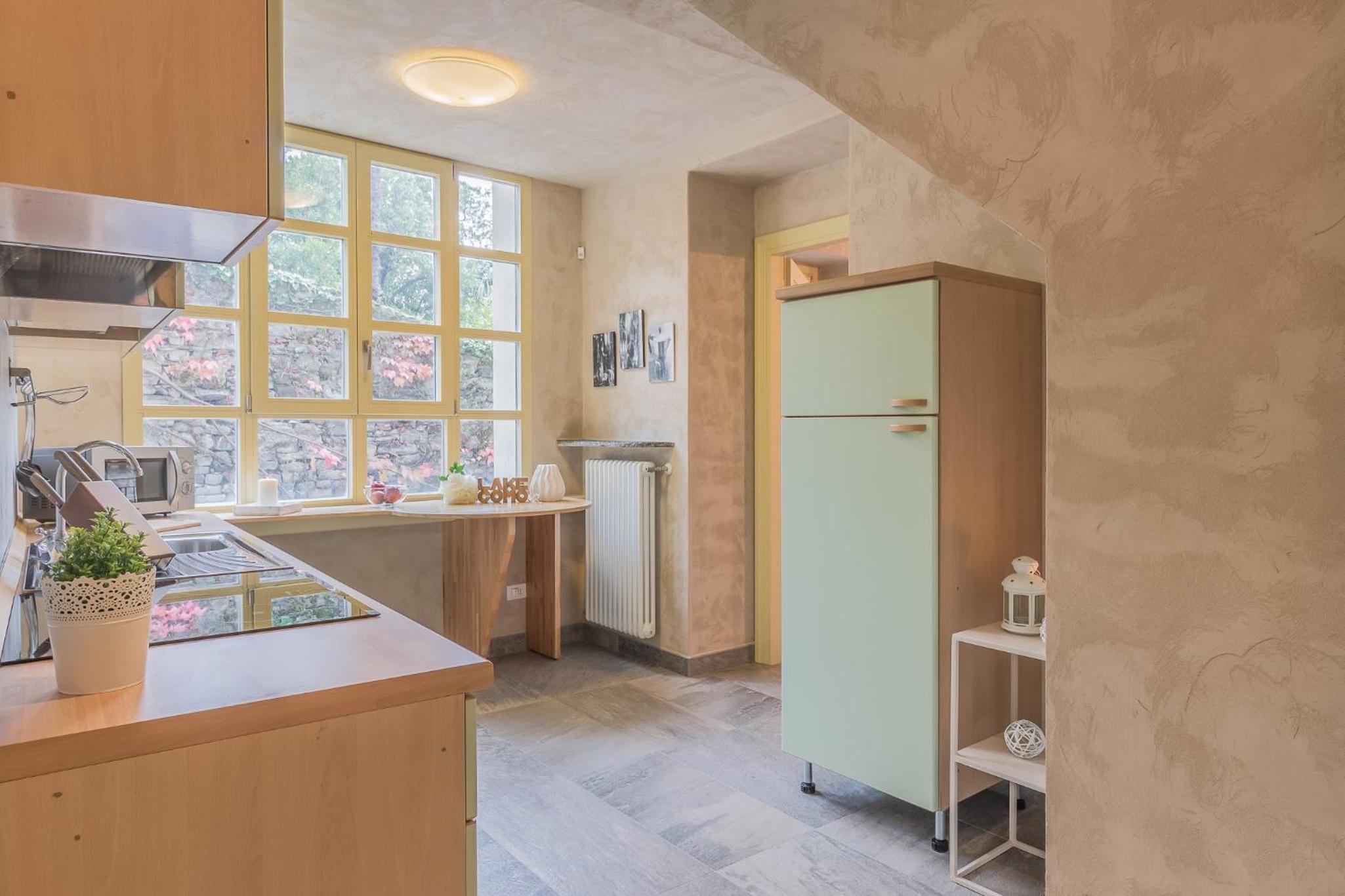 Del Duca Apartment en Varenna — kitchen
