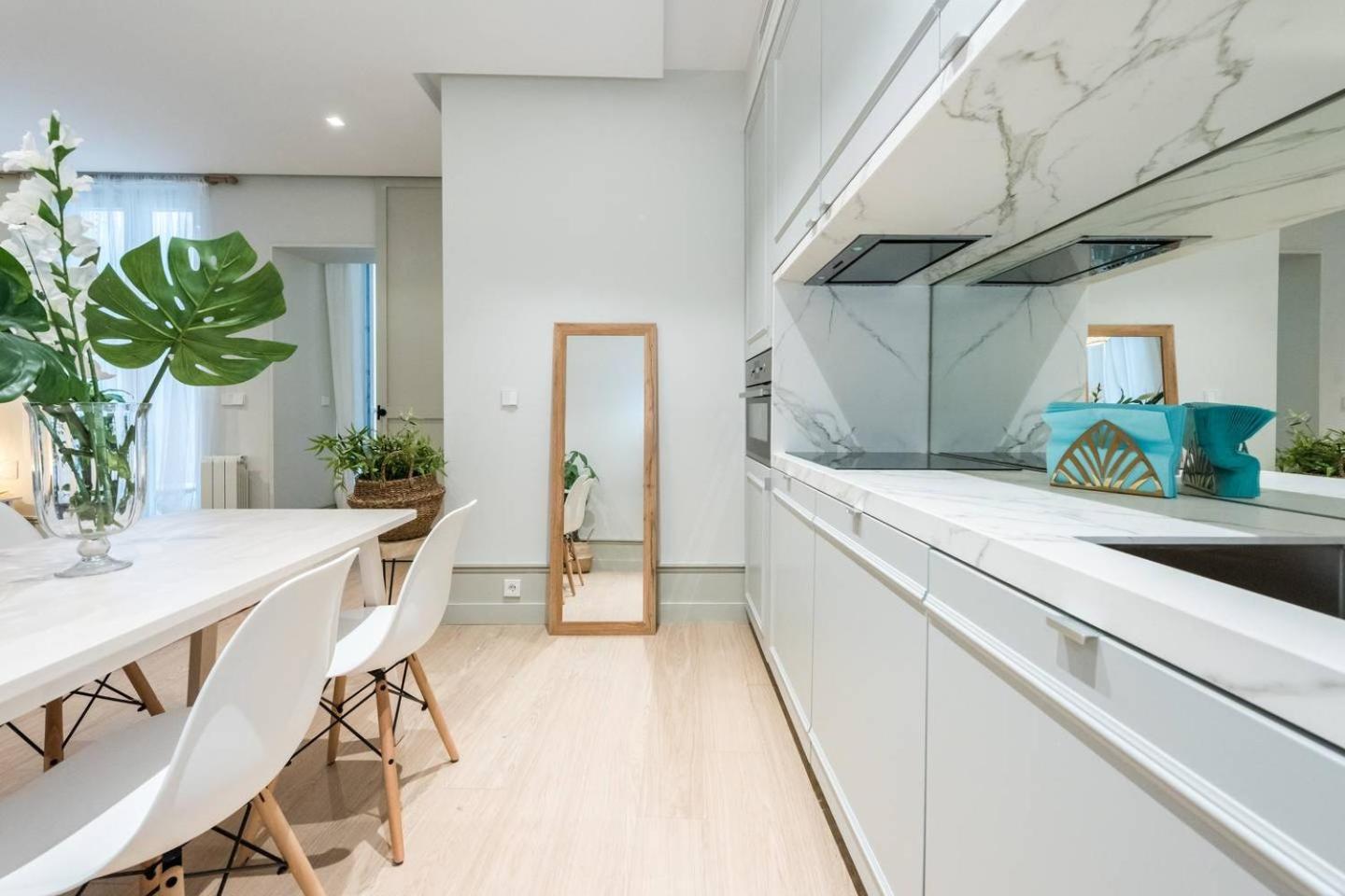 Explore Madrid from a warm apartment with patio at a newly refurbished manorial building