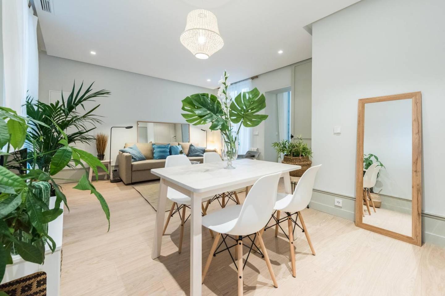 Explore Madrid from a warm apartment with patio at a newly refurbished manorial building