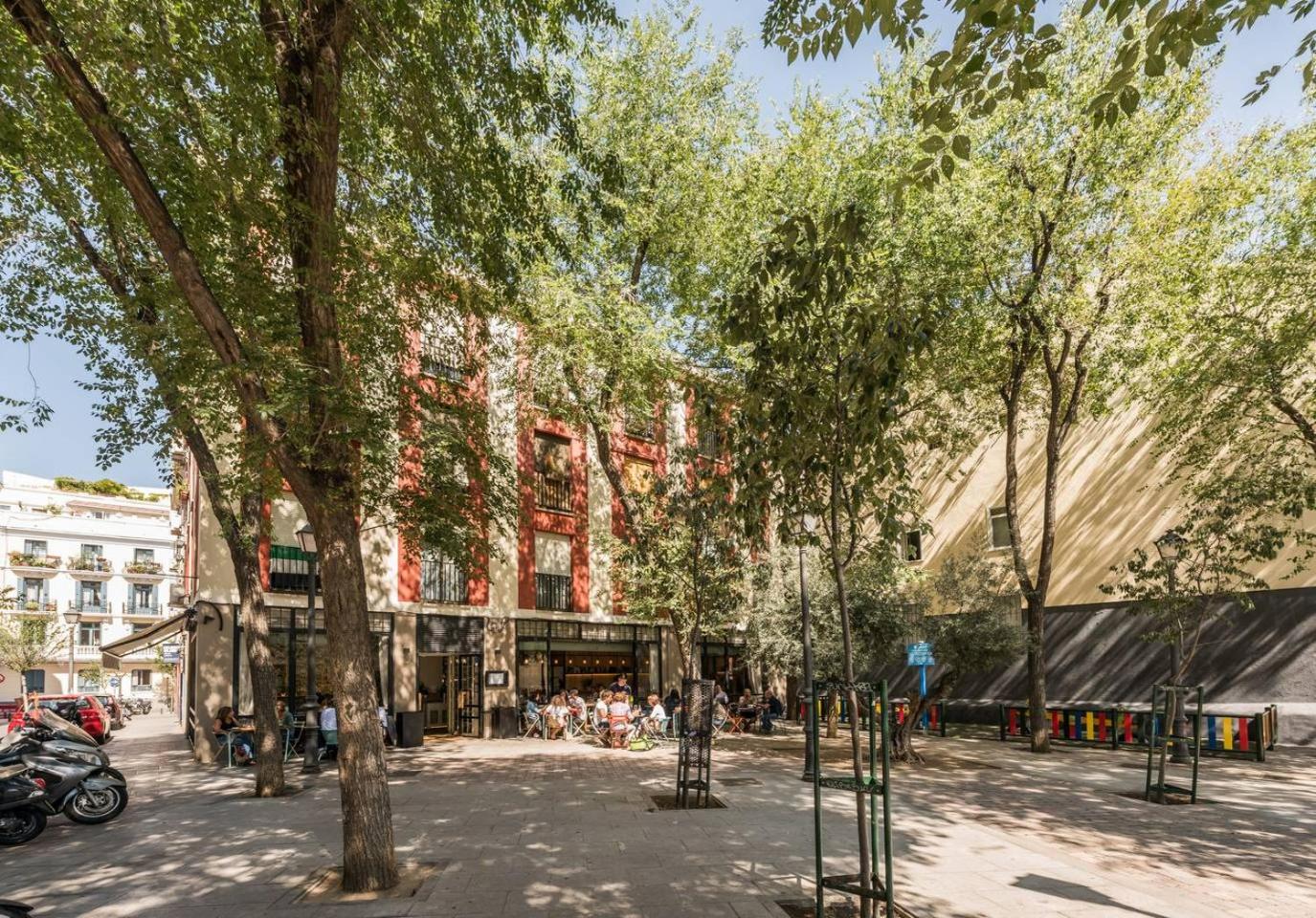 Explore Madrid from a warm apartment with patio at a newly refurbished manorial building