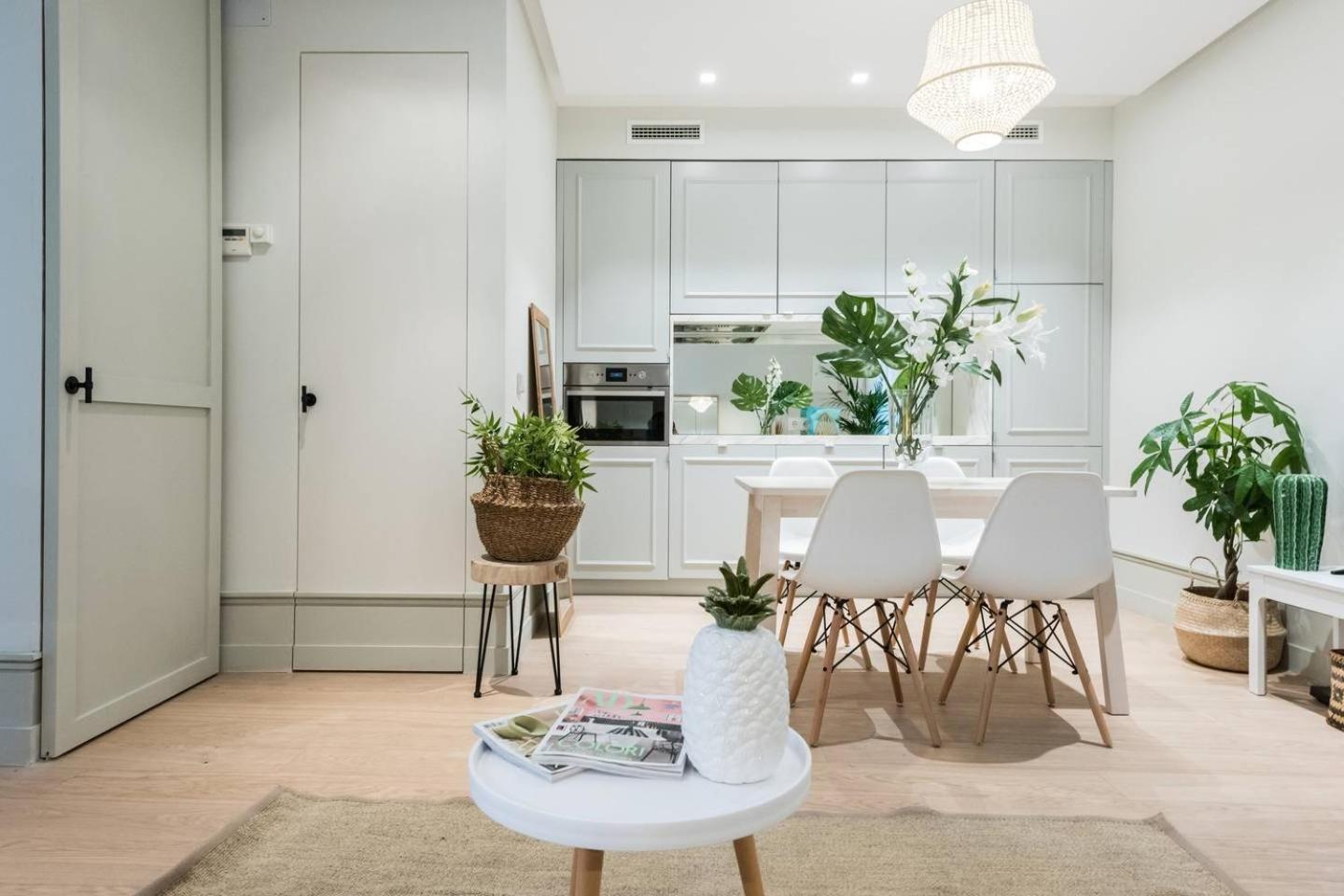Explore Madrid from a warm apartment with patio at a newly refurbished manorial building
