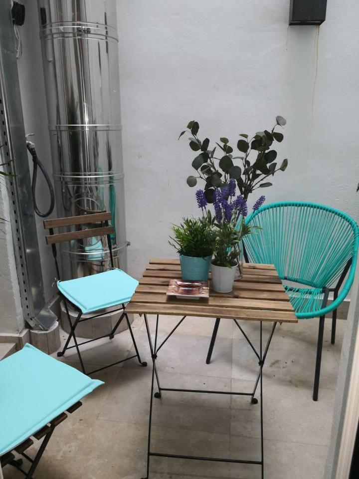 Explore Madrid from a warm apartment with patio at a newly refurbished manorial building