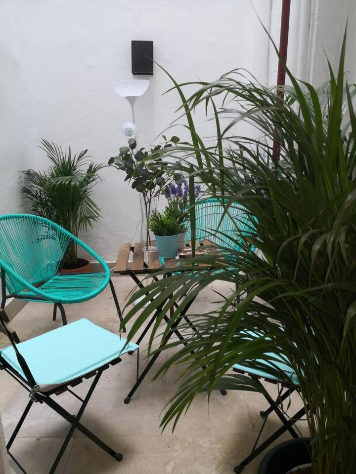Explore Madrid from a warm apartment with patio at a newly refurbished manorial building