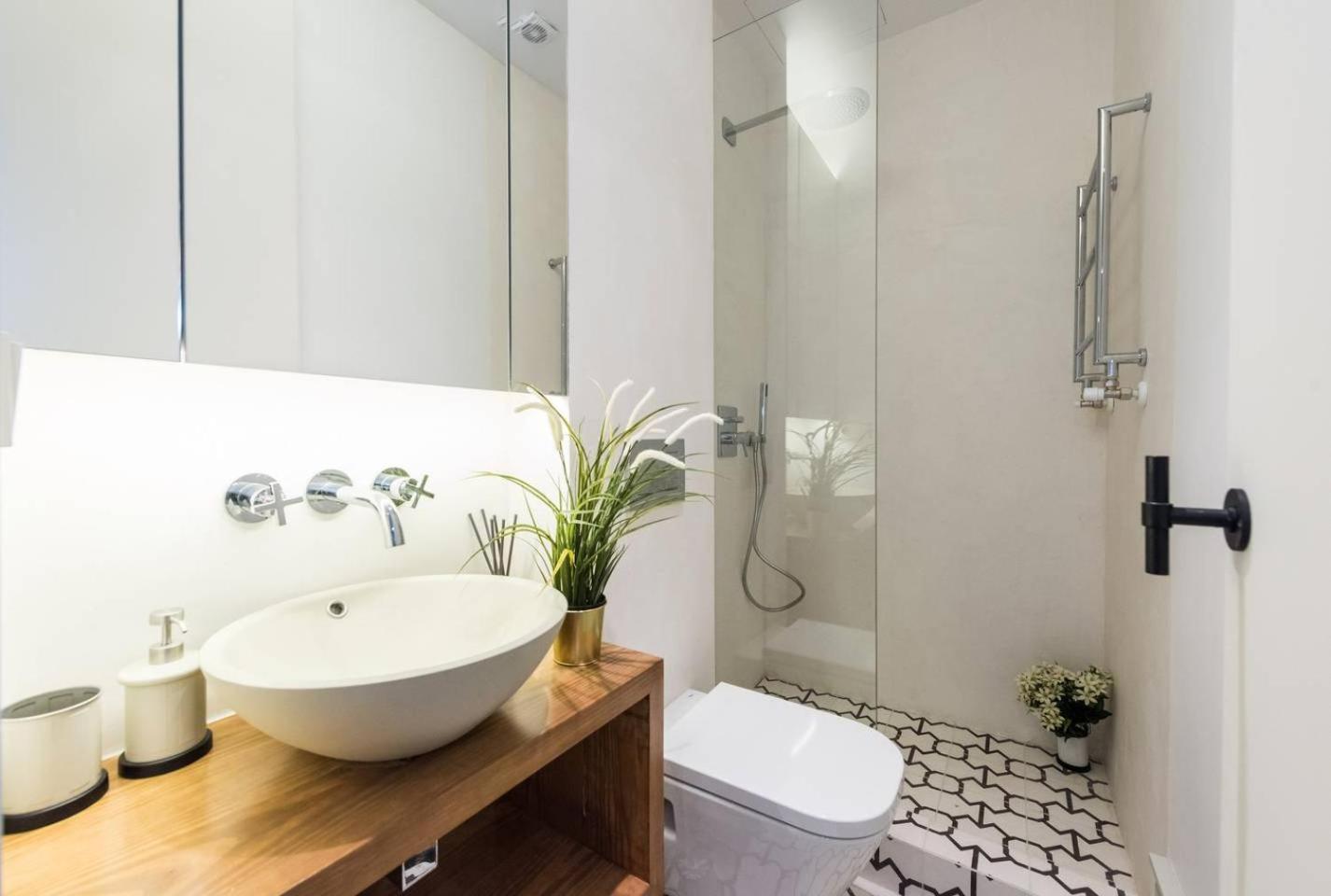 Explore Madrid from a warm apartment with patio at a newly refurbished manorial building