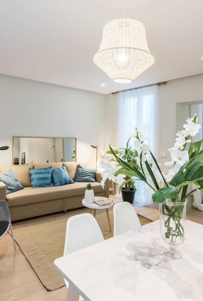 Explore Madrid from a warm apartment with patio at a newly refurbished manorial building
