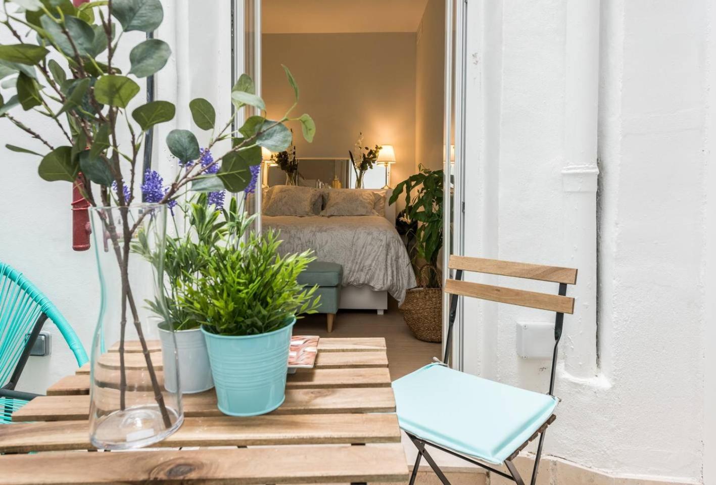 Explore Madrid from a warm apartment with patio at a newly refurbished manorial building