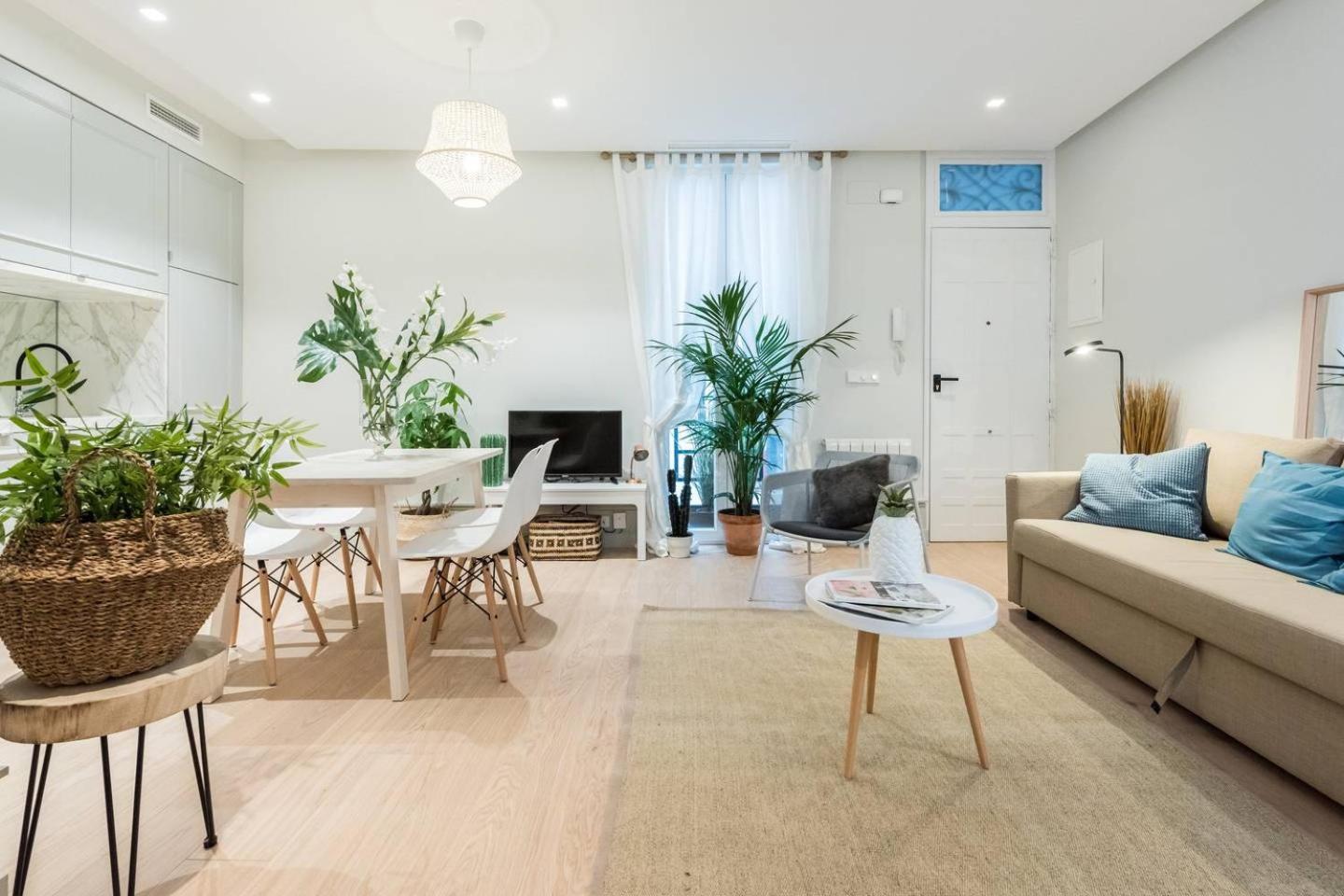 Explore Madrid from a warm apartment with patio at a newly refurbished manorial building