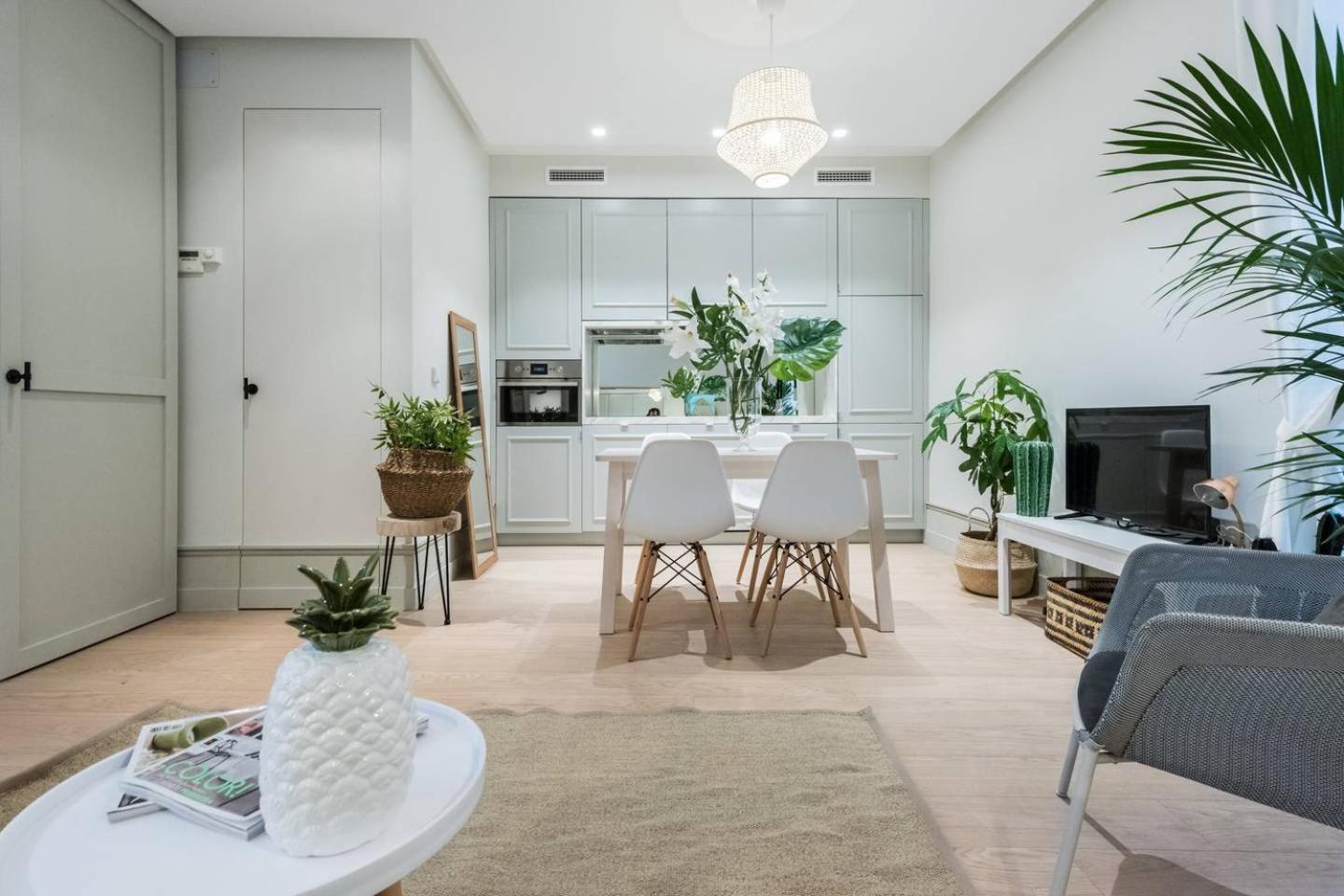 Explore Madrid from a warm apartment with patio at a newly refurbished manorial building