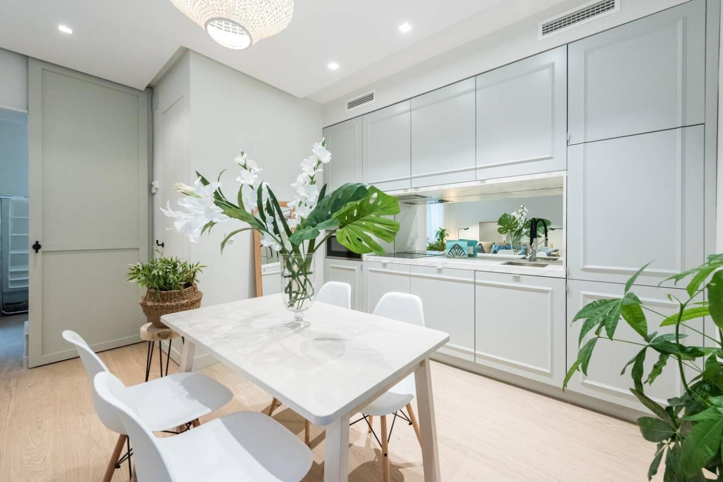 Explore Madrid from a warm apartment with patio at a newly refurbished manorial building
