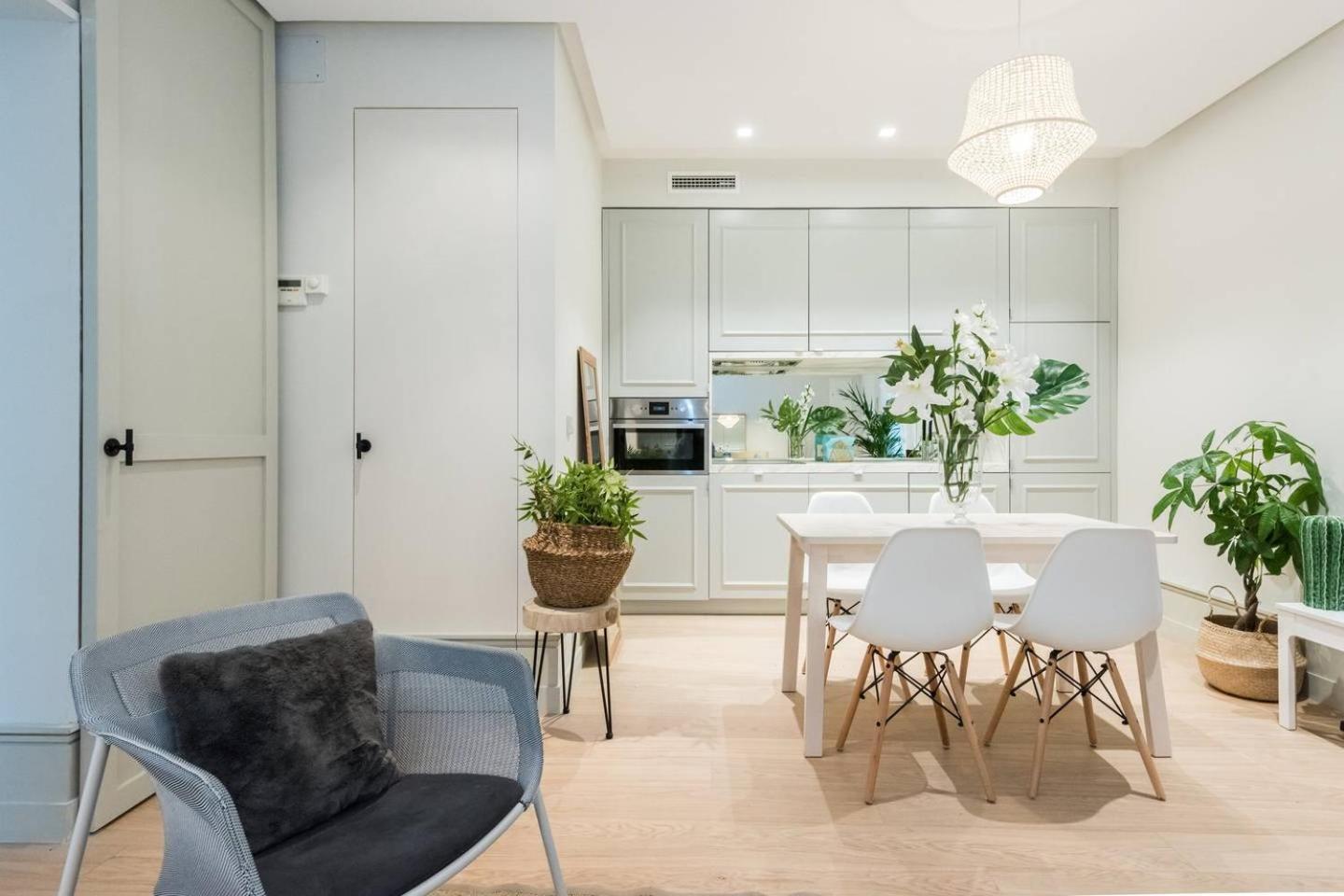 Explore Madrid from a warm apartment with patio at a newly refurbished manorial building