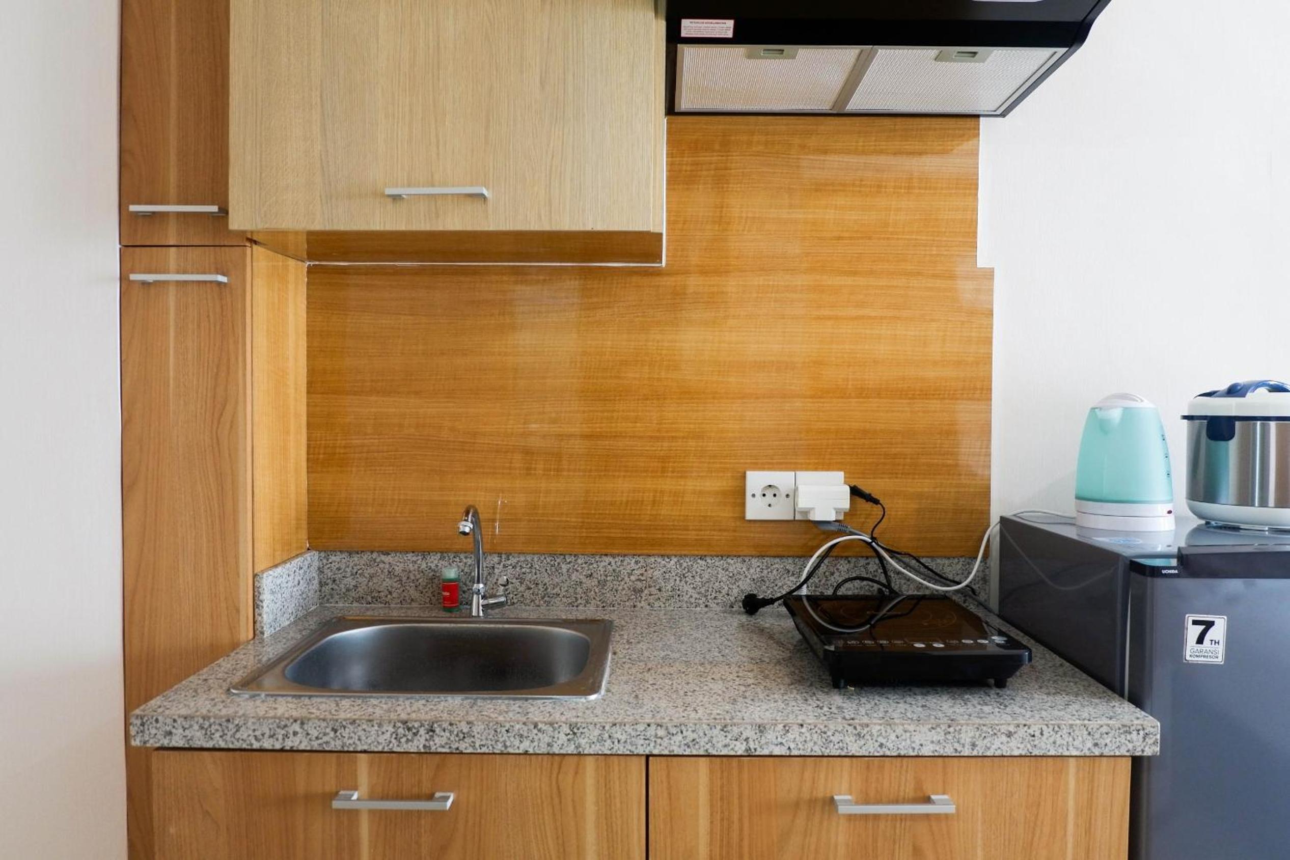 Strategic Studio Apartment at Orchard Mansion Supermall By Travelio, Surabaya - 10