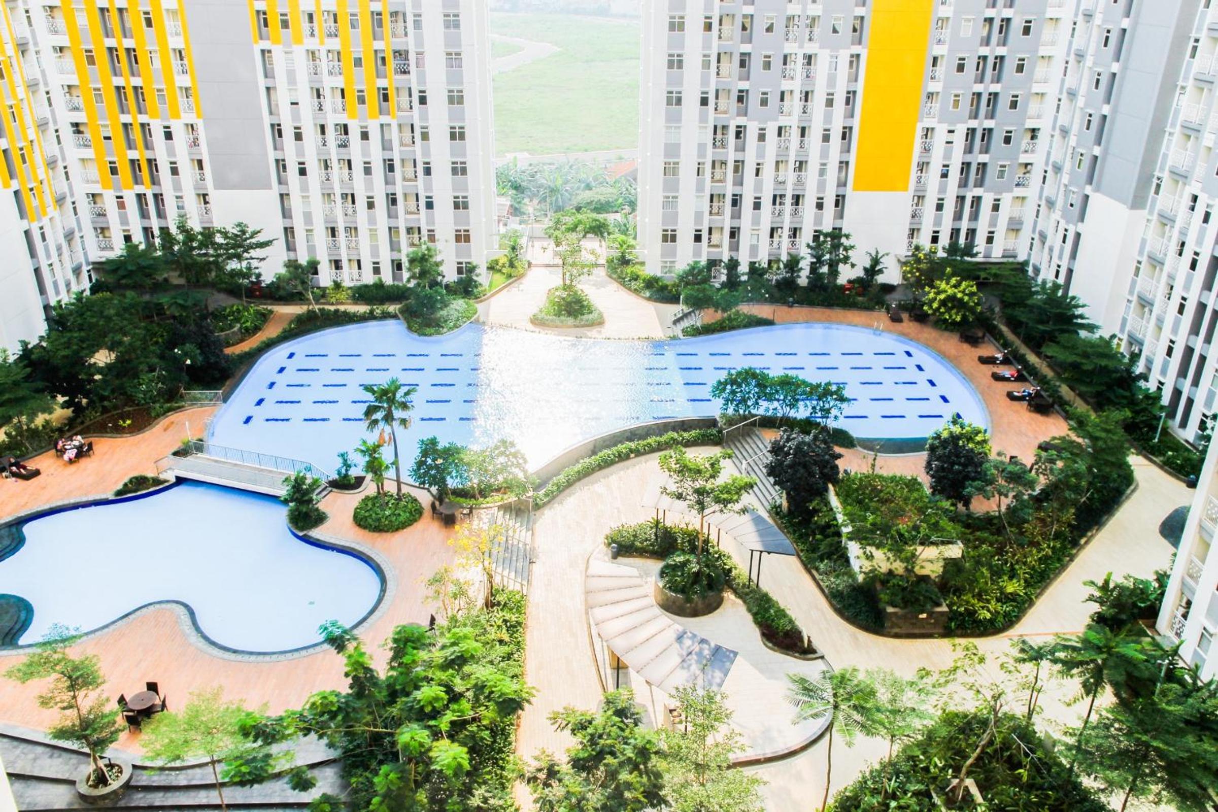 Comfortable 2BR Springlake Summarecon Apartment By Travelio