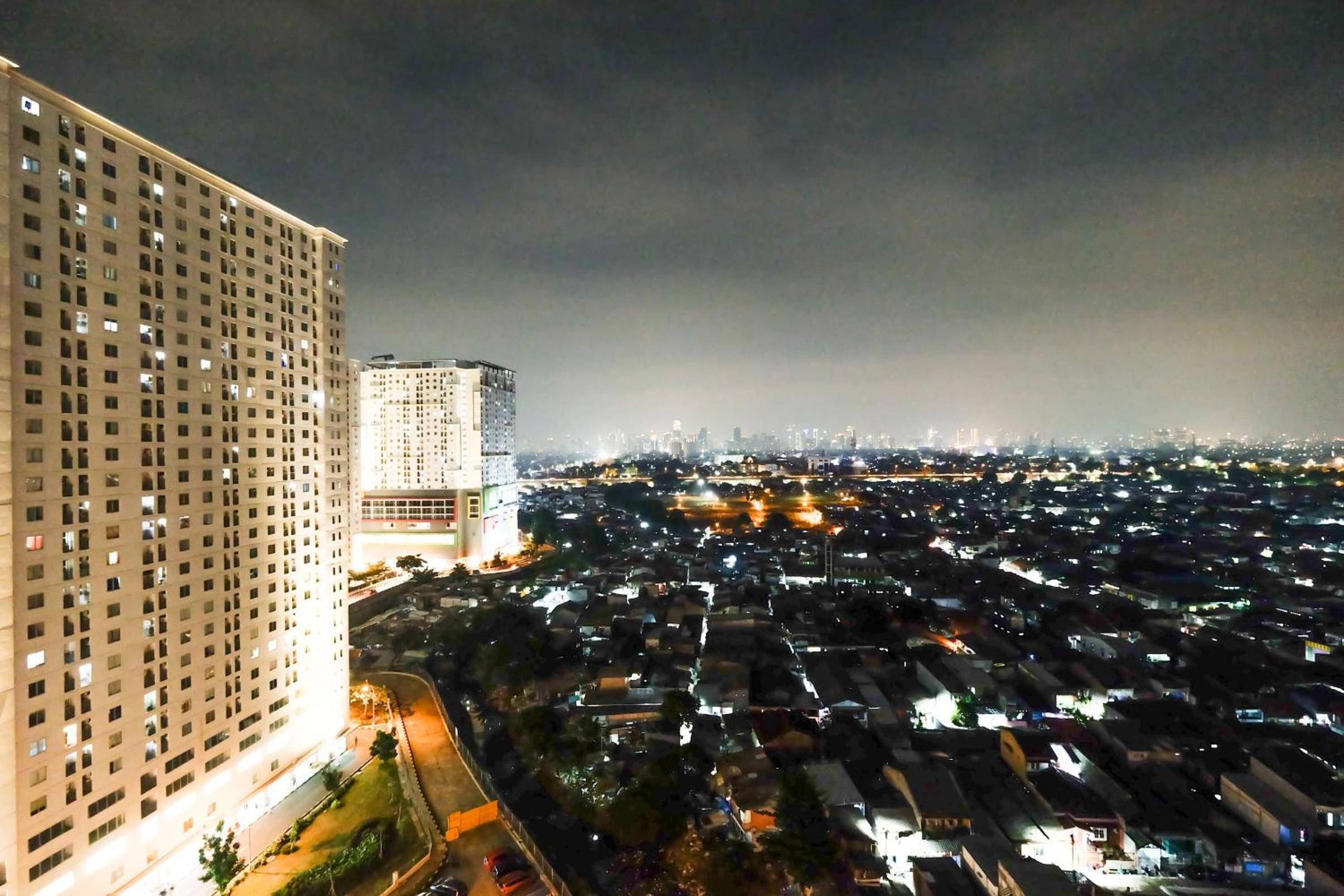 Classic 2BR Bassura City Apartment By Travelio